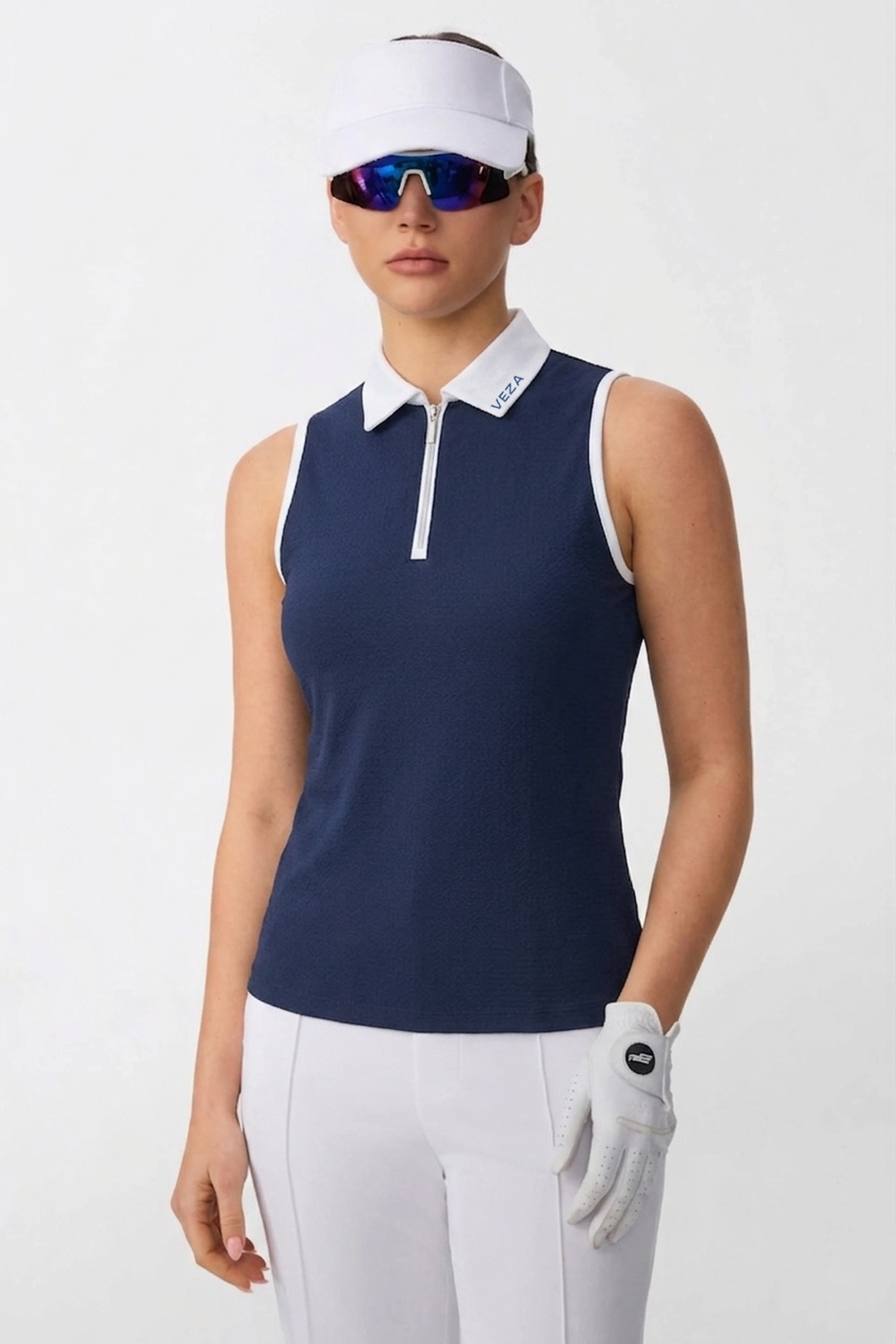 The Sleeveless Zip Neck Golf Polo - Navy