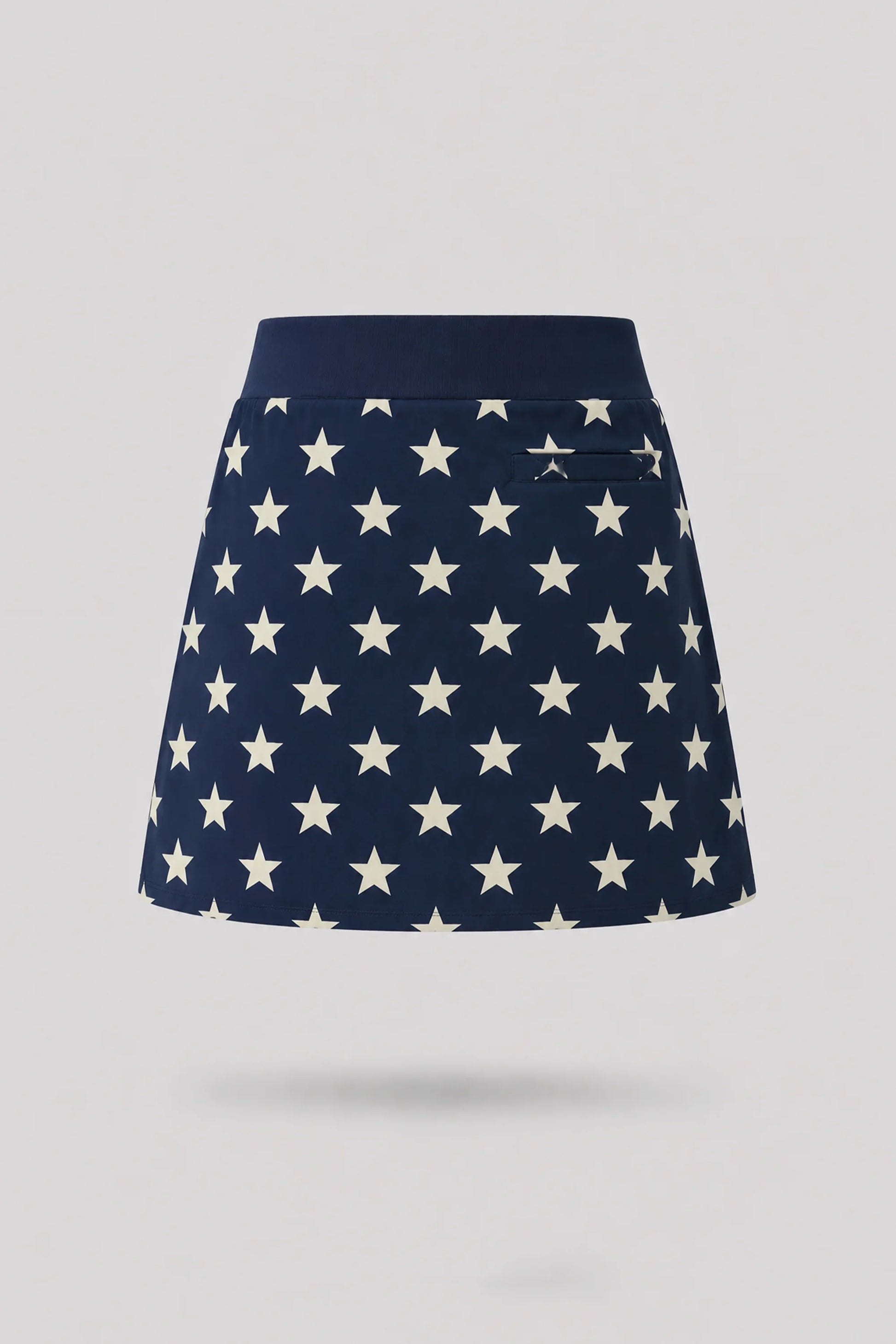 Women's patterned golf skort in Starfield print with A-line silhouette and comfortable wide waistband