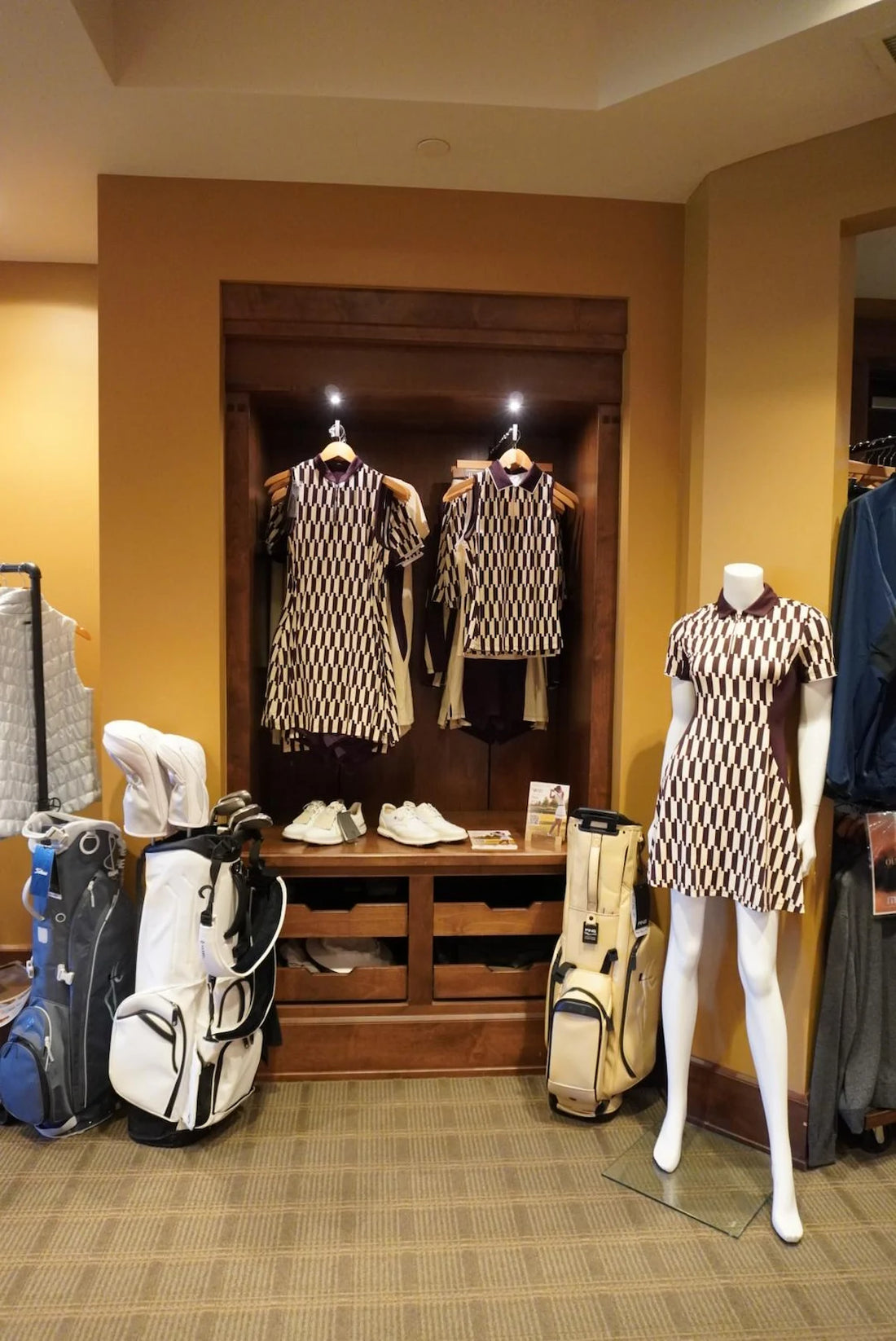 VEZA GOLF golf apparel displayed in the pro shop at Almaden Golf & Country Club