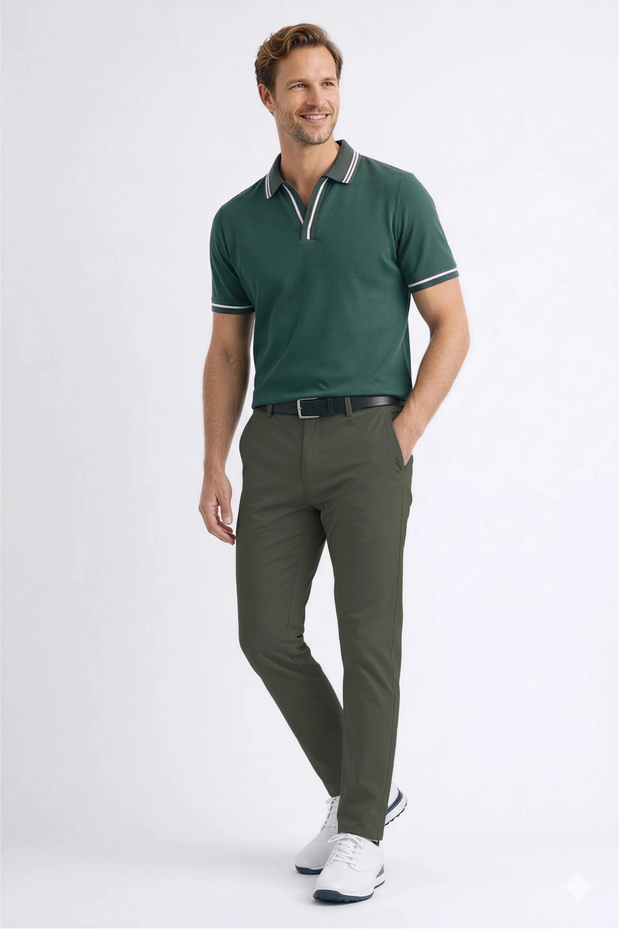 Men’s Dusty Olive tapered golf pants styled with a classic golf polo for a polished course look