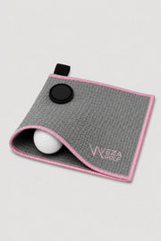 Magnetic golf towel in gray with pink trim featuring microfiber fabric and quick access design
