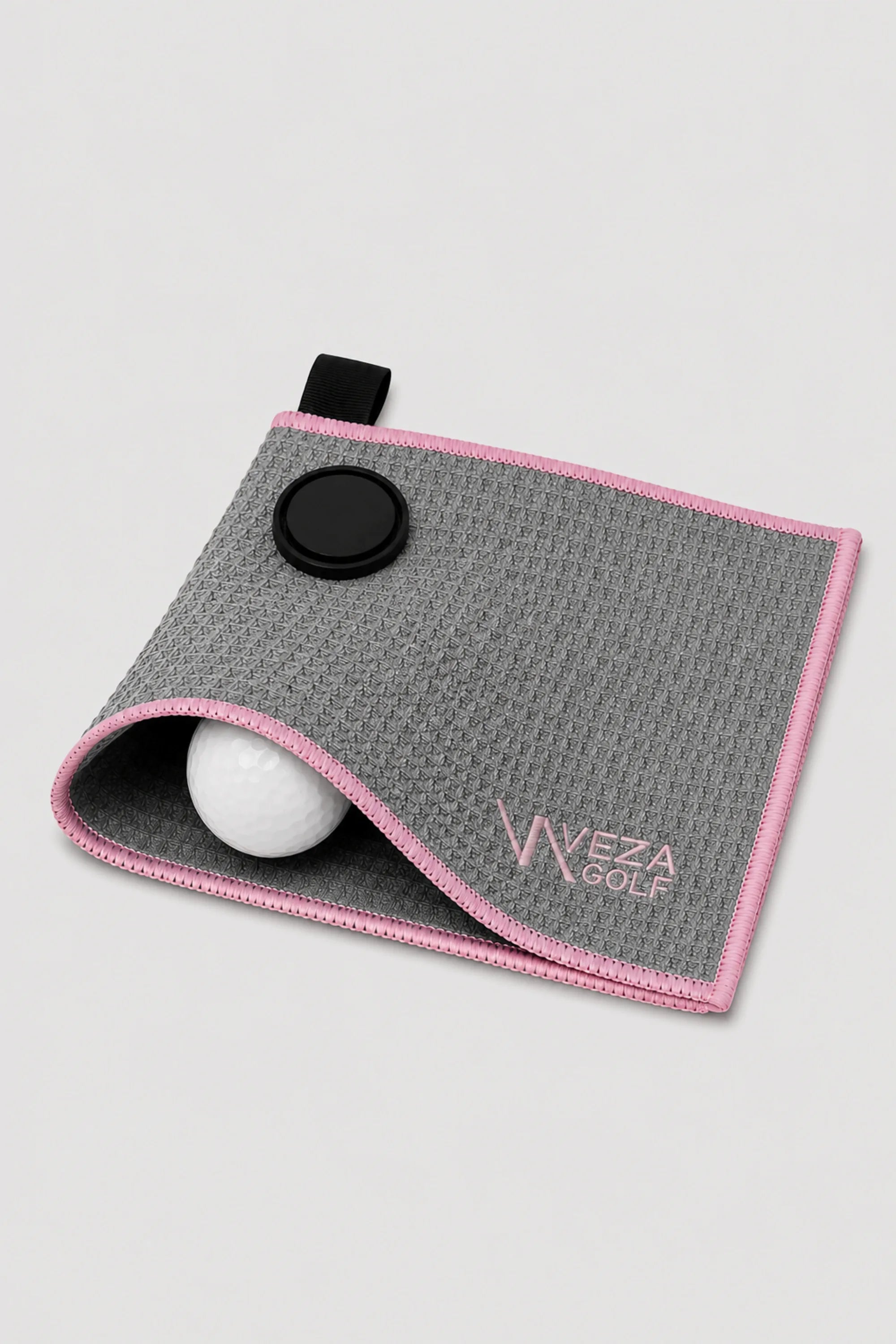 Magnetic golf towel in gray with pink trim featuring microfiber fabric and quick access design