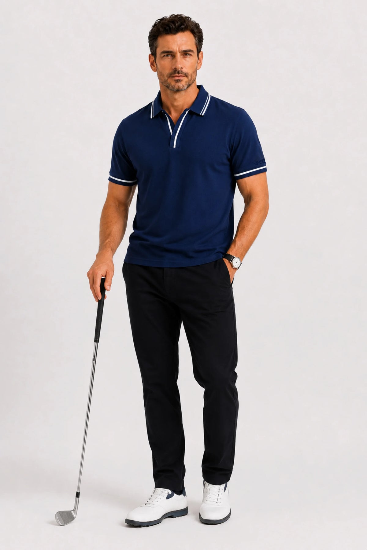 Men’s performance golf polo in Midnight Navy featuring breathable fabric and contrast trim detailing