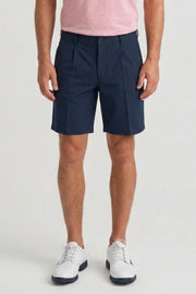 Men’s Oxford Navy pleated golf shorts featuring a tailored fit and refined front pleat details