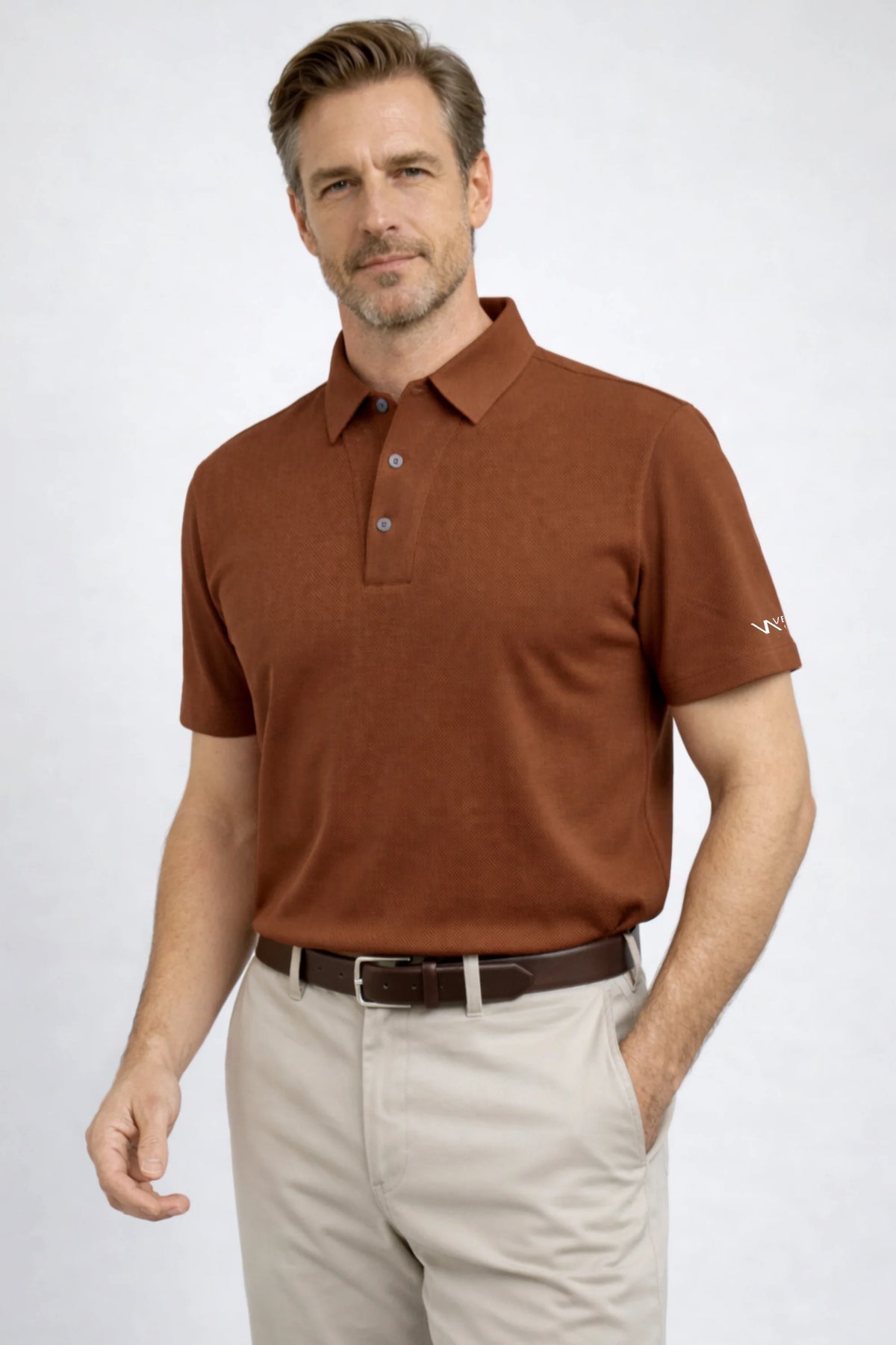 Men’s Rust Brown performance golf polo designed with structured texture and a polished on-course look