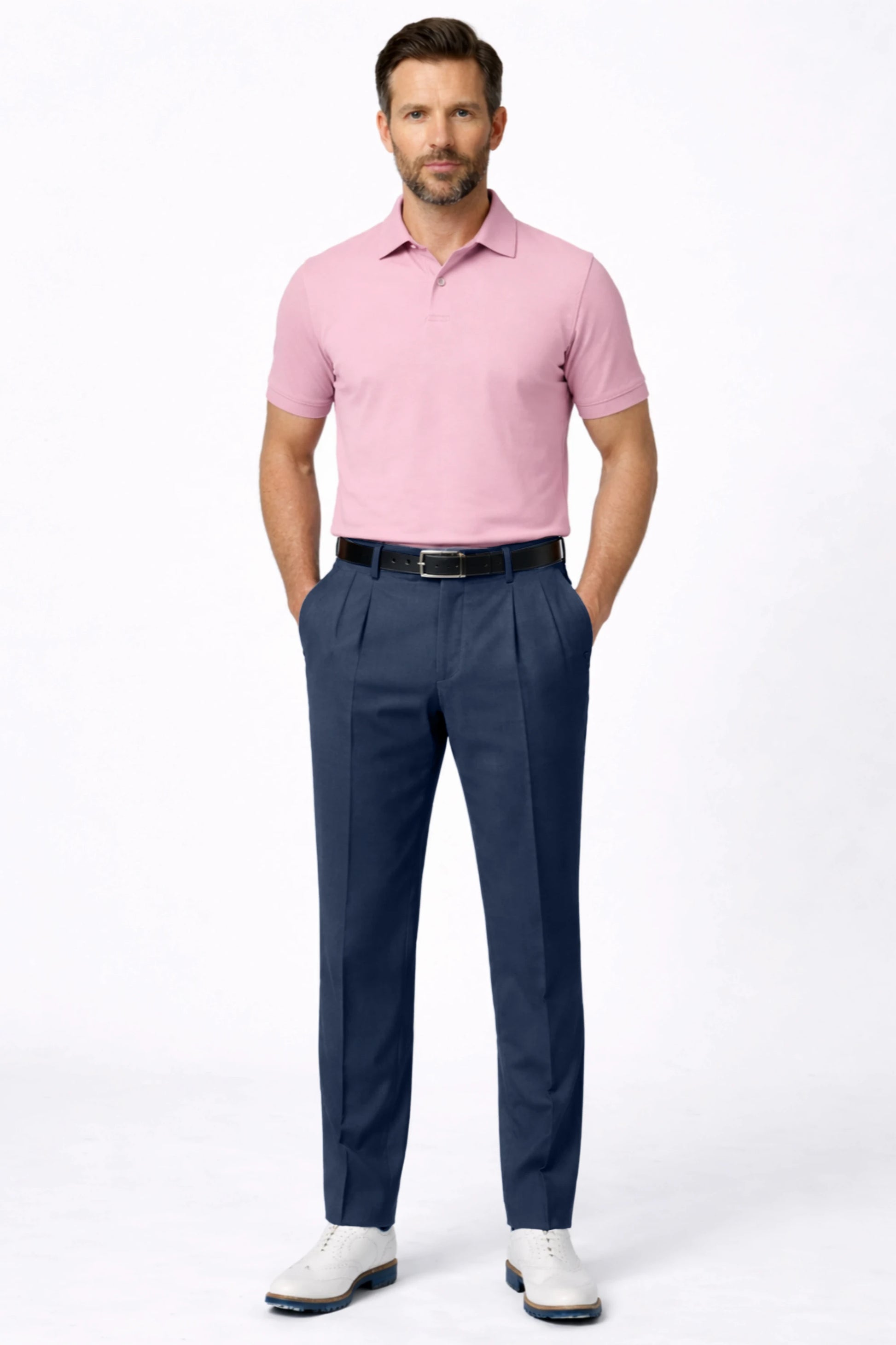 Men’s tailored golf pants in deep steel with pleated front, tapered legs, and a polished golf lifestyle look
