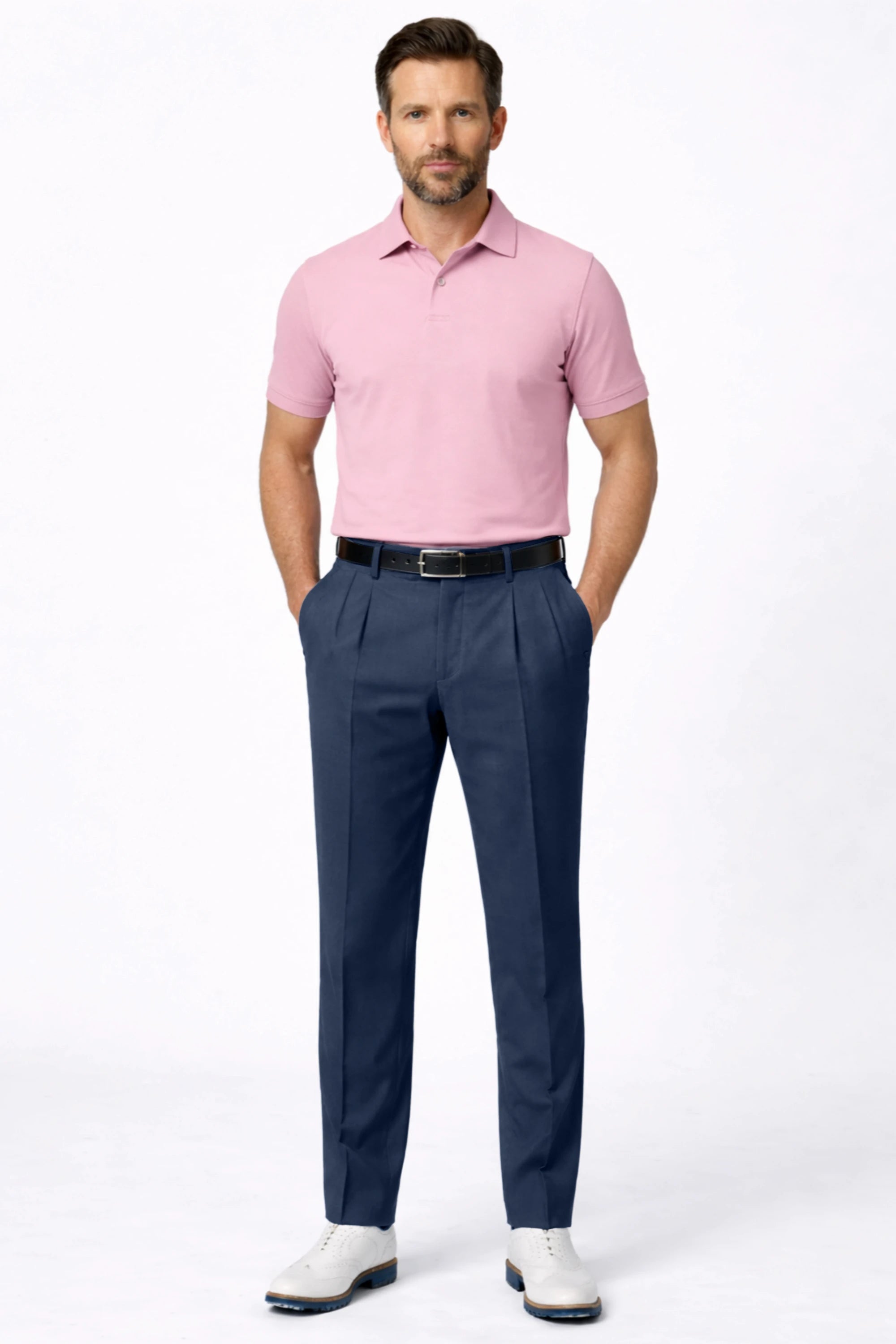 Men’s tailored golf pants in deep steel with pleated front, tapered legs, and a polished golf lifestyle look