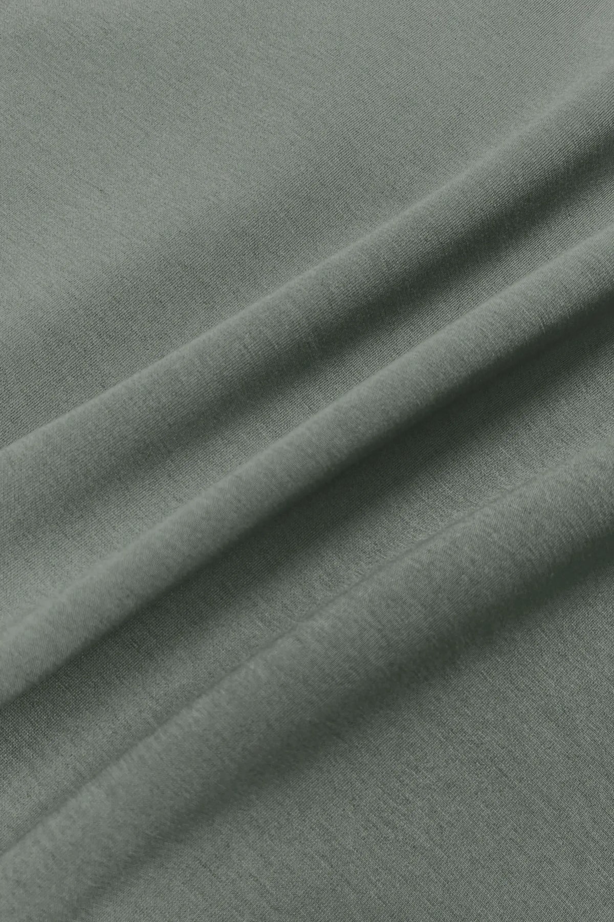Close-up of Sage Grey Sculpt Drawstring Jogger Pants showing the soft fabric texture and smooth finish