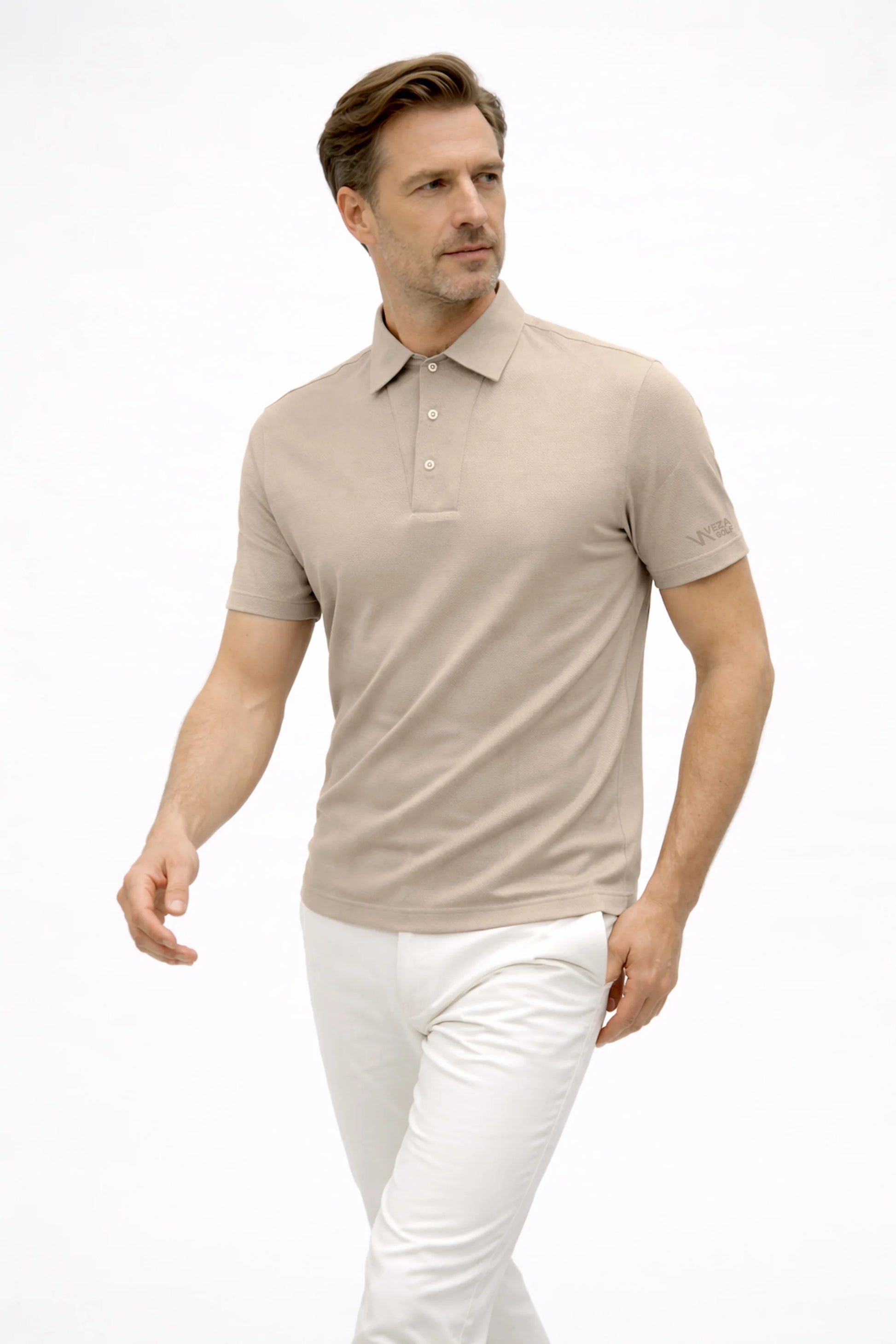 Men’s Soft Ivory textured golf polo shirt showing the structured silhouette and premium fabric texture