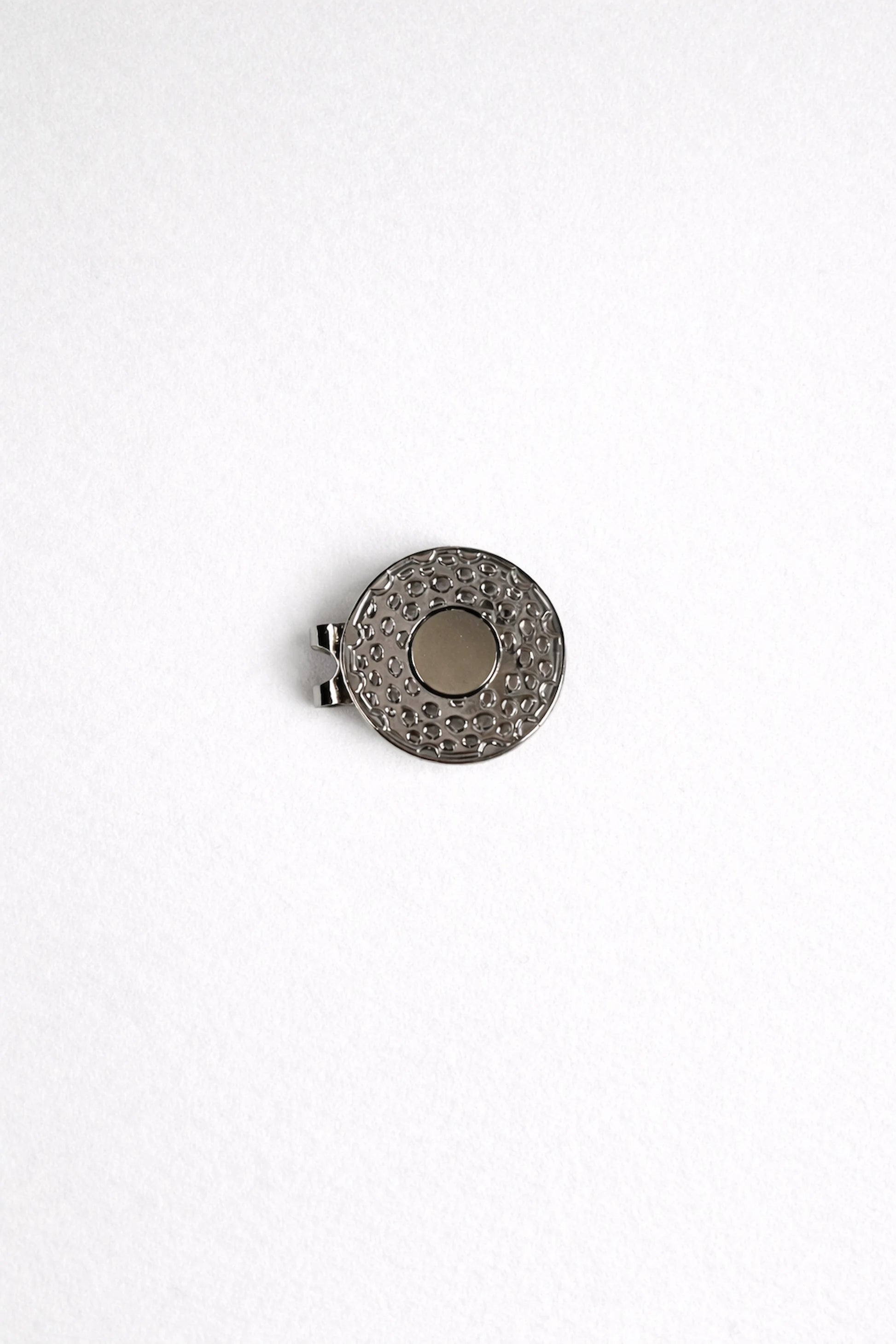 Back view of VEZA magnetic golf ball marker hat clip showing the magnetic base