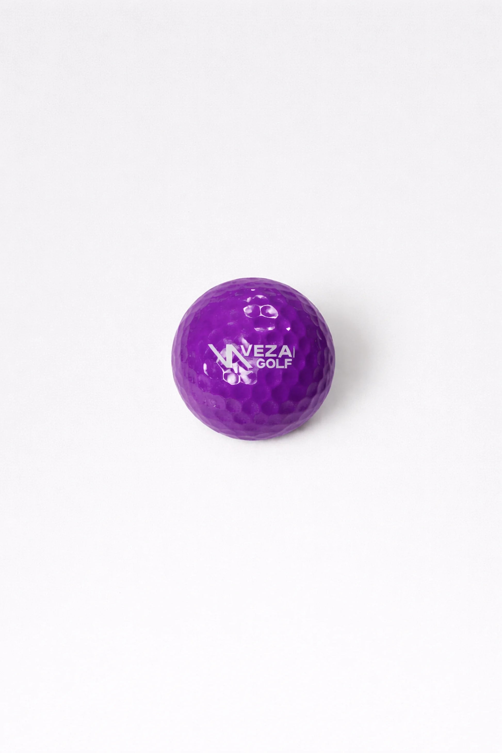 Purple VEZA surlyn golf ball with VEZA logo