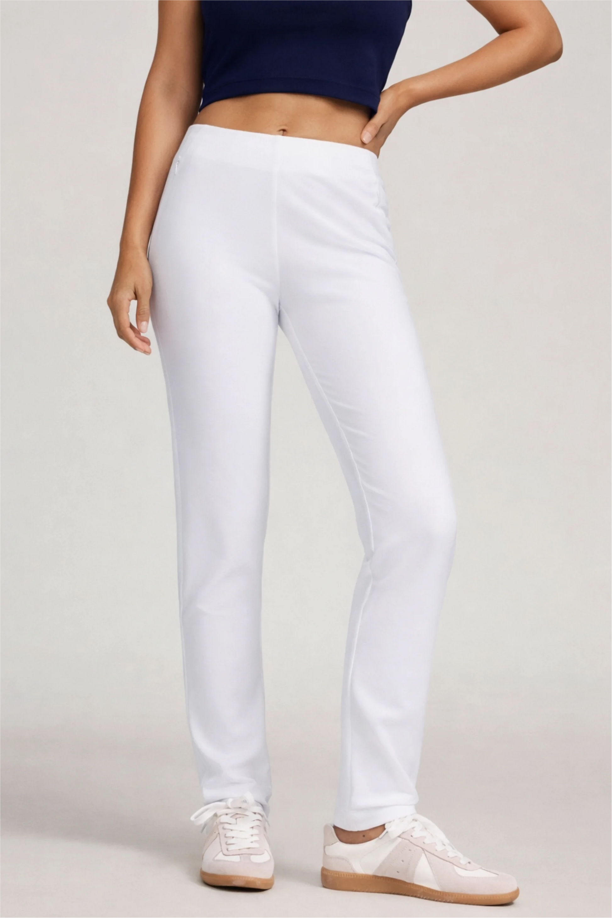 Women’s Cloudline golf pants with zip pockets and slim straight-leg fit, front view