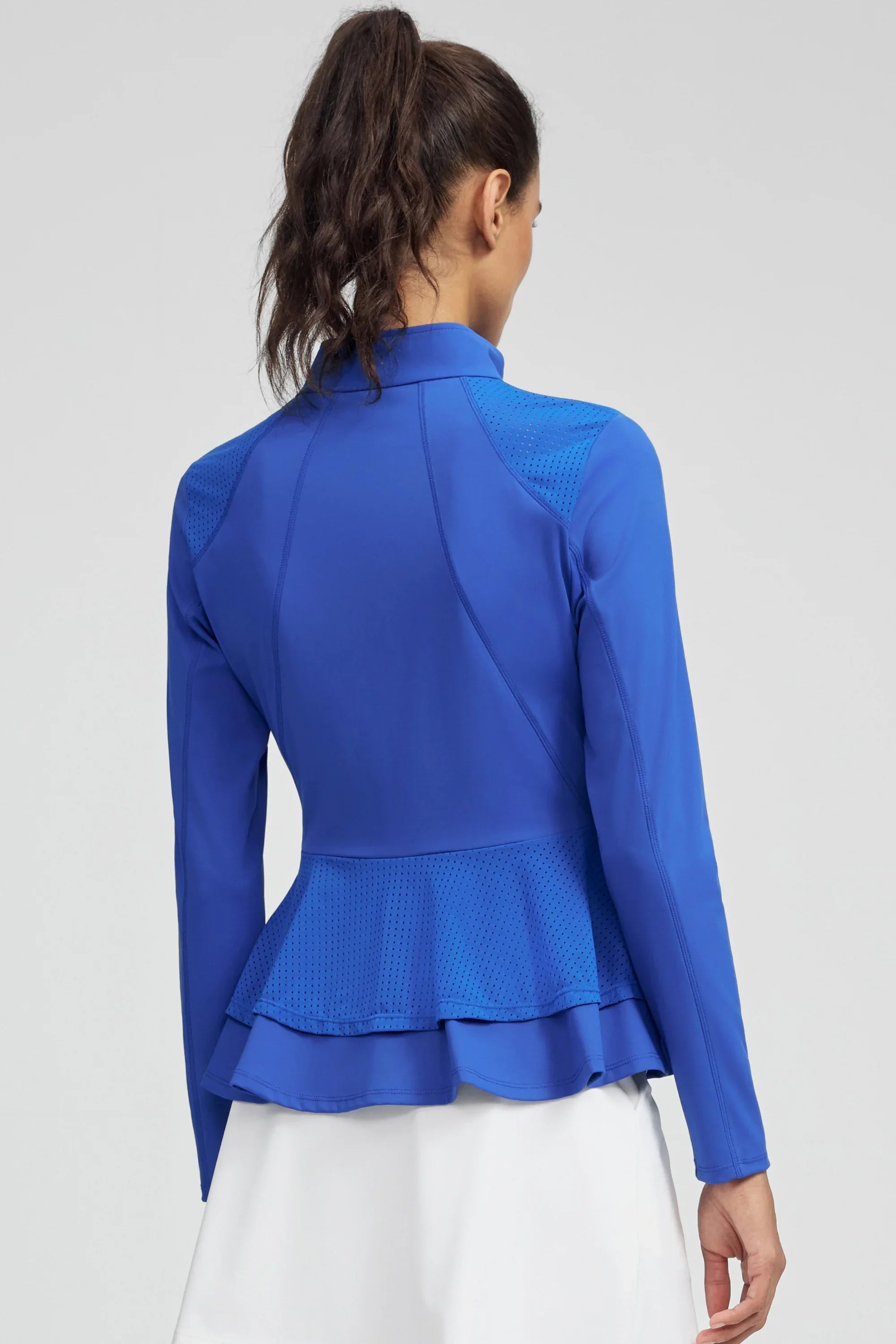 Back view of VEZA cobalt bloom blue mesh-panel zip jacket with a flattering peplum silhouette