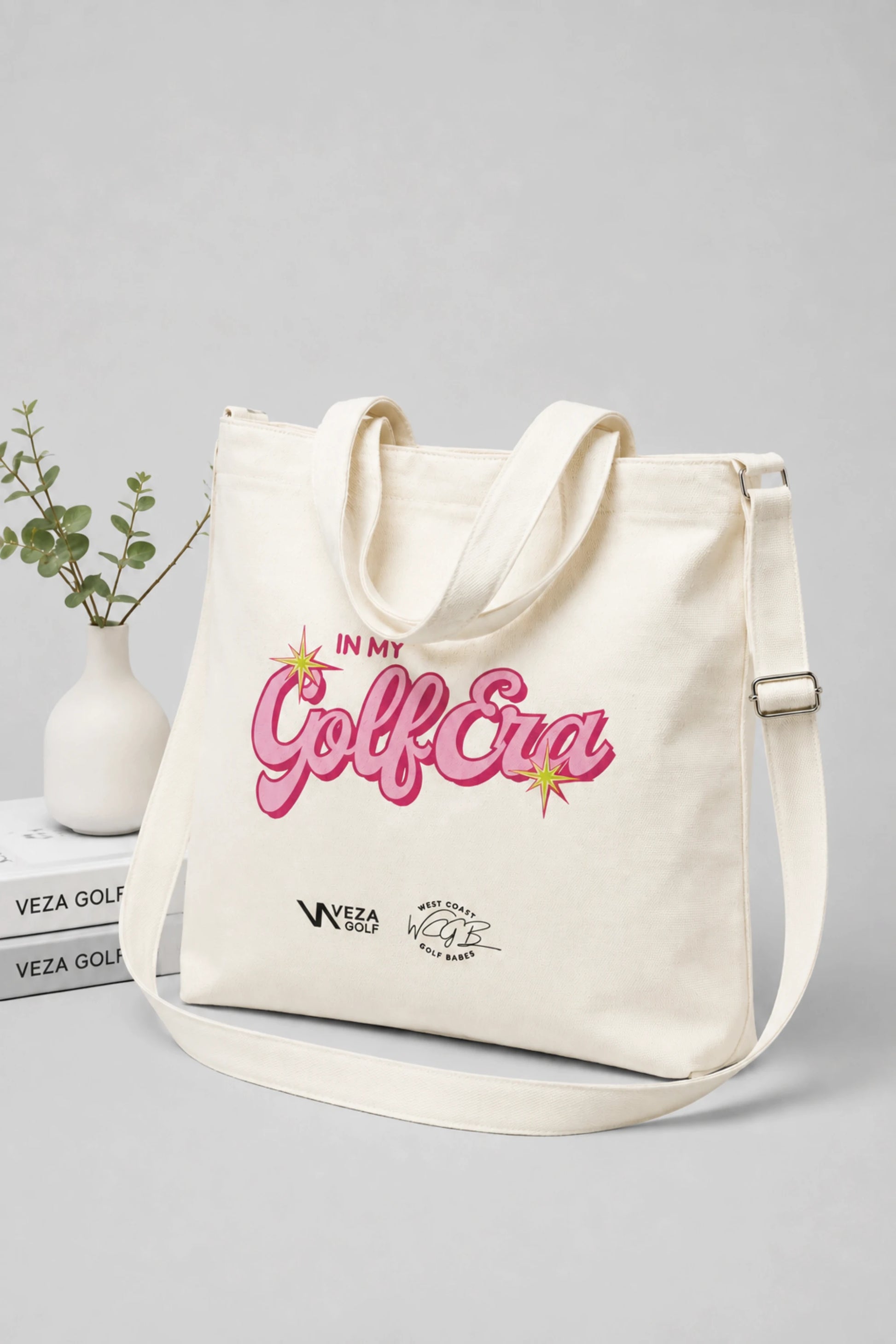 Women’s golf canvas tote bag with pink In My Golf Era graphic and VEZA Golf x WCGB logos