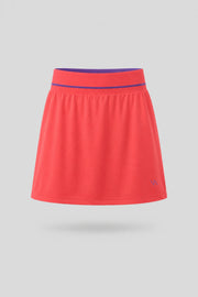 Women's coral red golf skort with A-line silhouette and comfortable wide waistband