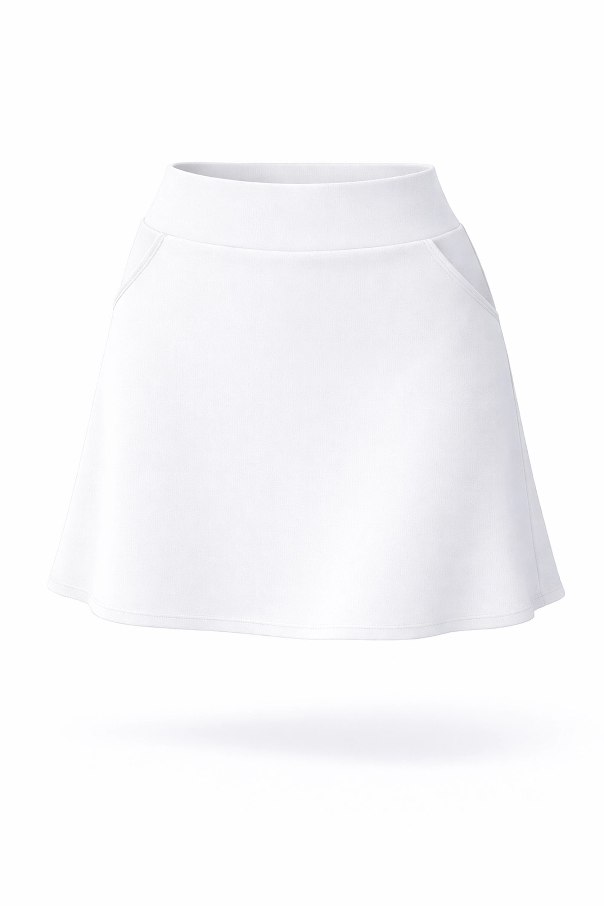 Front view of women’s bright white smooth A-line golf skort with pockets