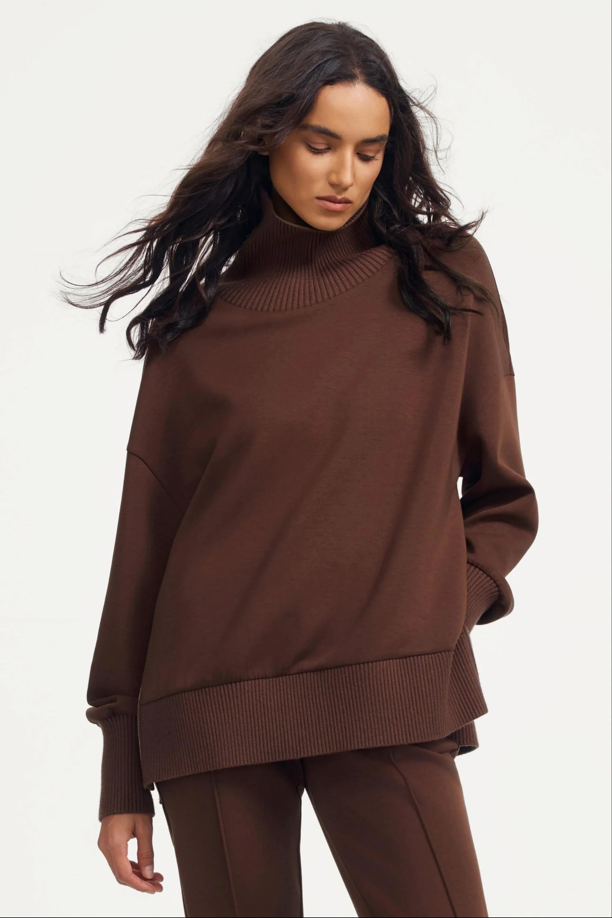 Women’s brown funnel-neck pullover with relaxed fit and ribbed high neck