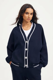 Women’s button cardigan in midnight navy with contrast trim and a clean V-neck front