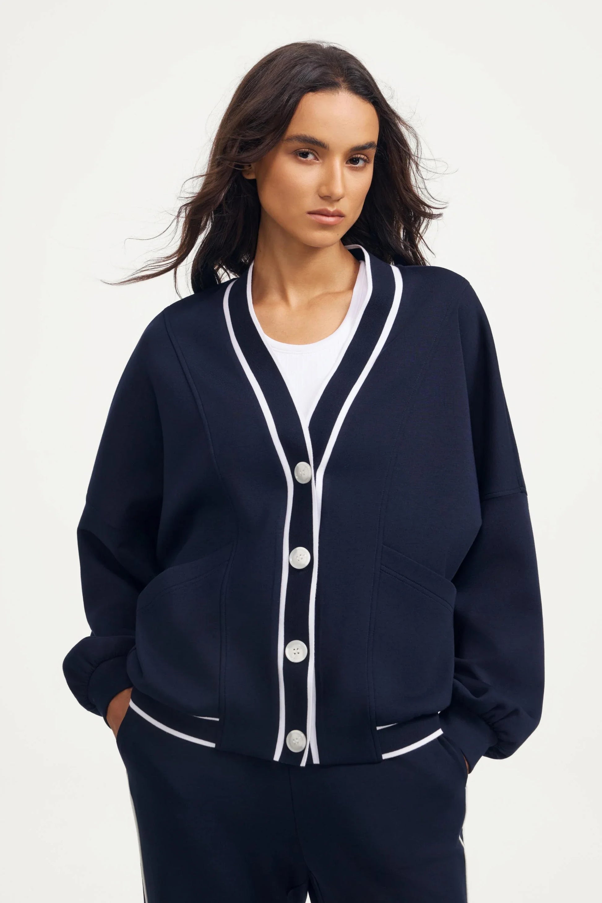 Women’s button cardigan in midnight navy with contrast trim and a clean V-neck front