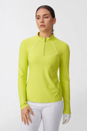 Front view of women’s citron yellow quarter-zip UPF 50+ golf top with sculpted contrast piping