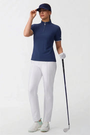 Women’s navy zip-neck golf top with a fitted contour silhouette, short sleeves, and performance golf design