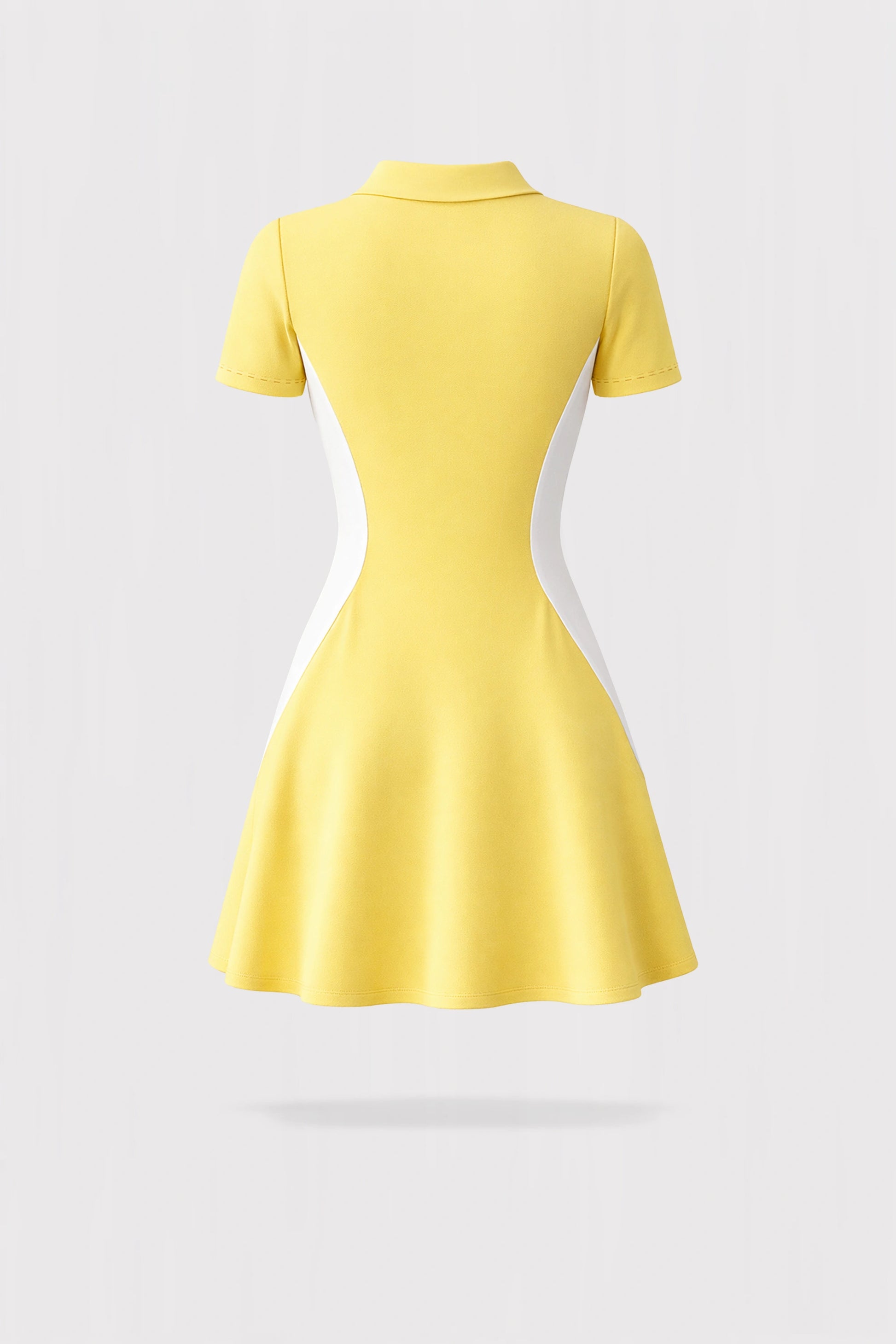 Back view of a women’s yellow contour zip polo golf dress with a flattering athletic silhouette