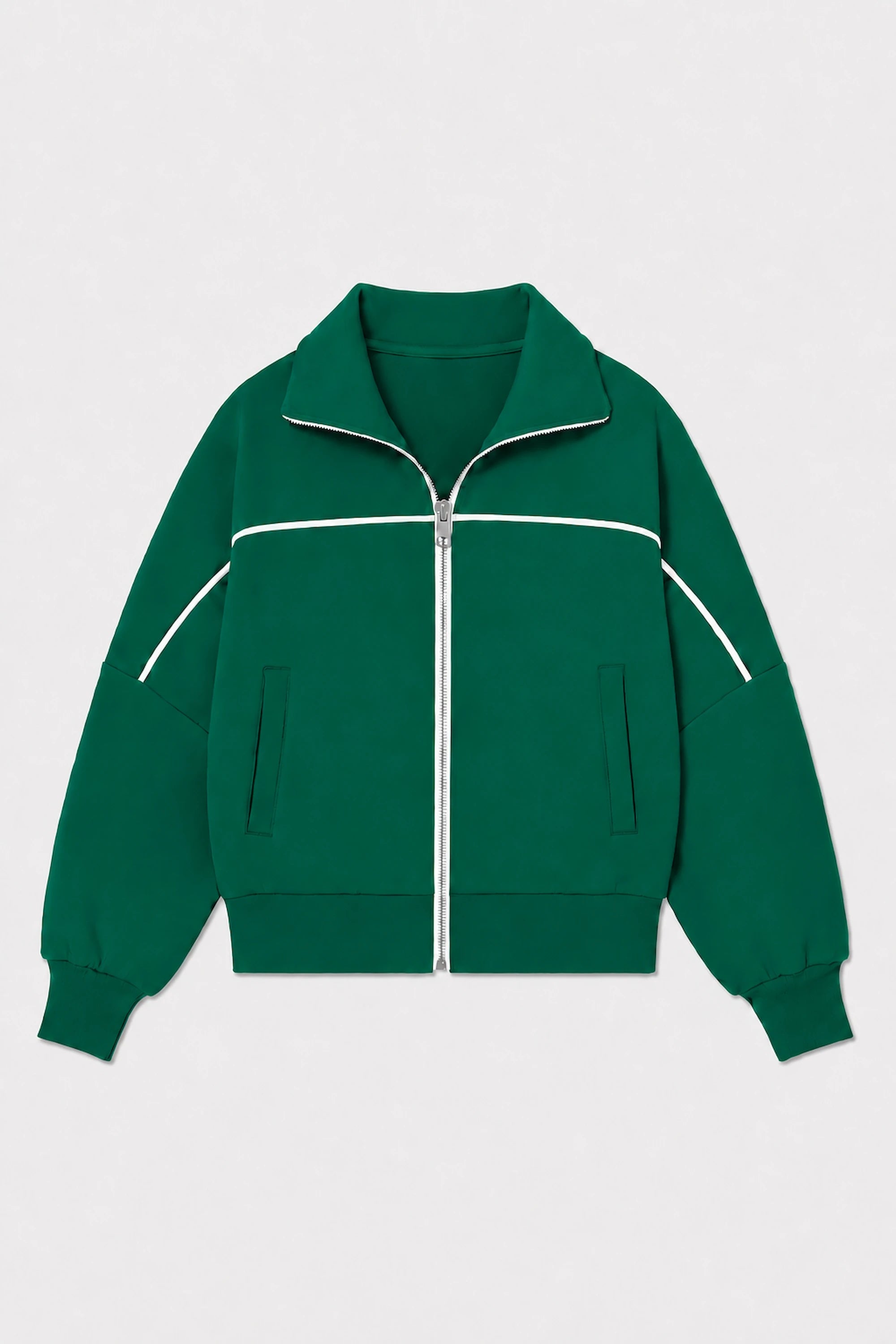 Front flat lay of VEZA women’s Deep Teal cropped golf jacket featuring contrast white piping, full-zip front, and side pockets