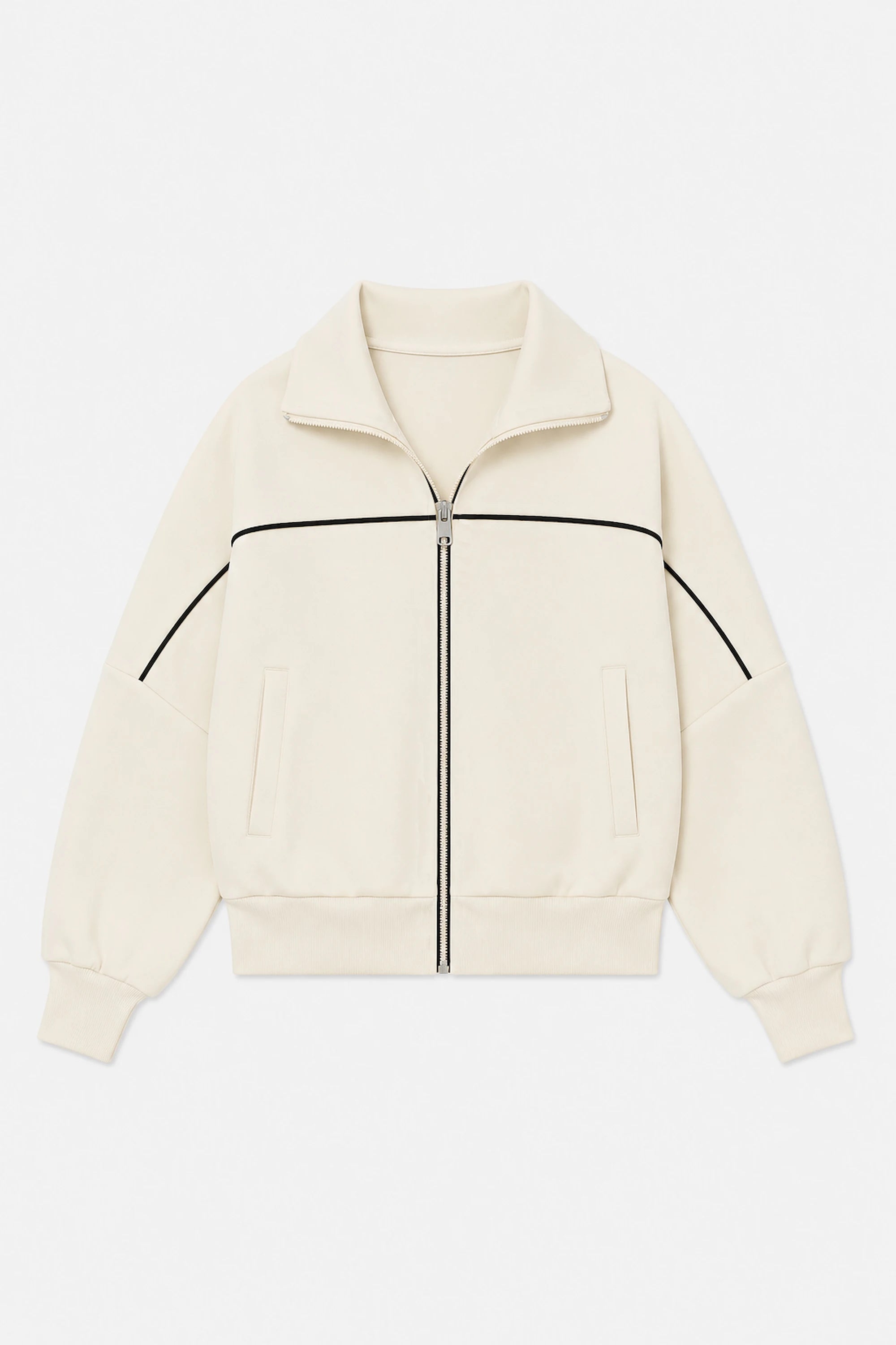 Front flat lay of VEZA women’s Soft Ivory cropped golf jacket featuring contrast black piping, full-zip front, and side pockets