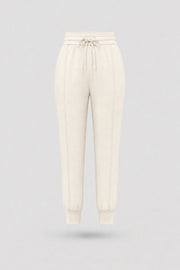 Women's Ivory drawstring jogger pants with relaxed silhouette, ribbed cuffs, and soft stretch fabric