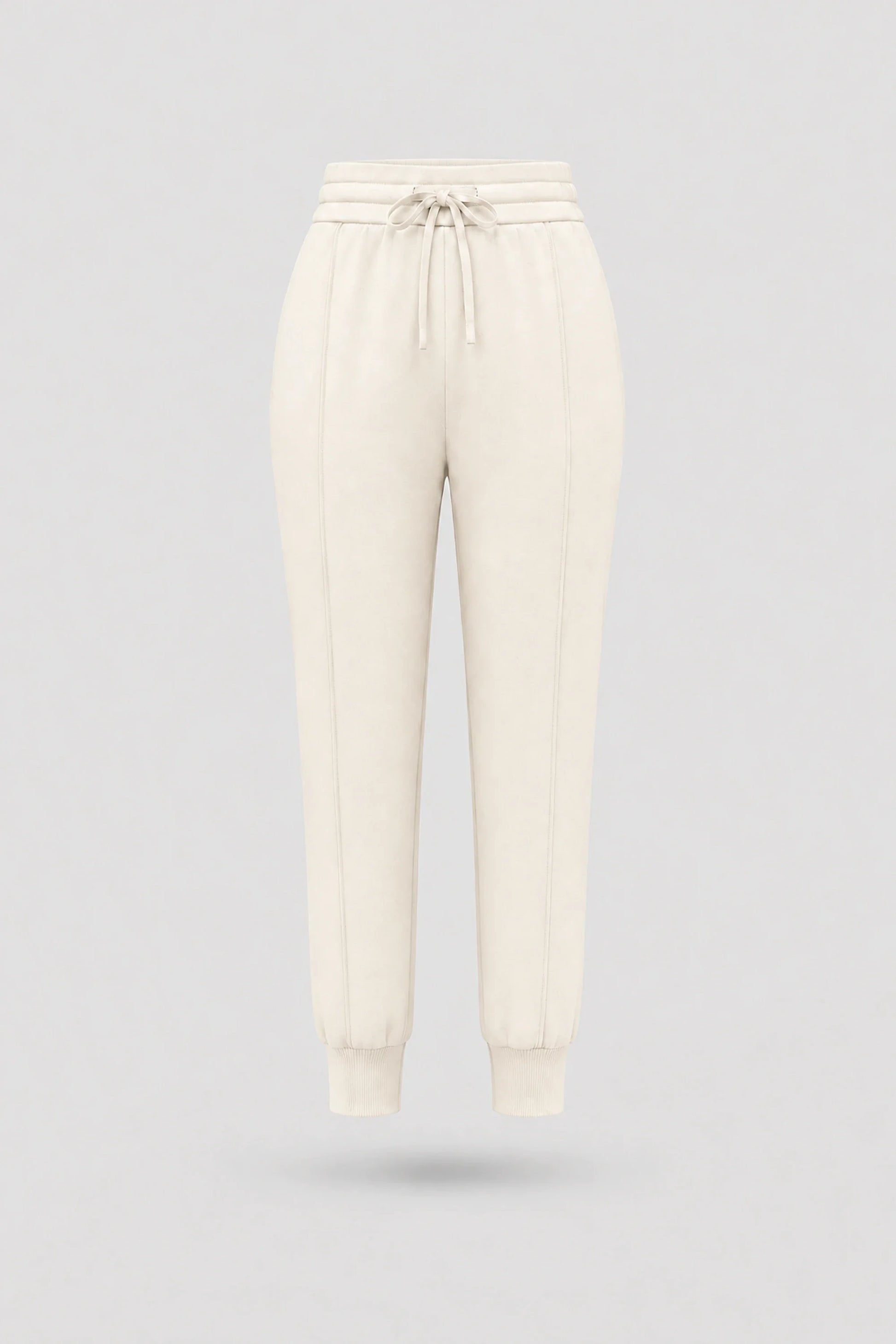 Women's Ivory drawstring jogger pants with relaxed silhouette, ribbed cuffs, and soft stretch fabric