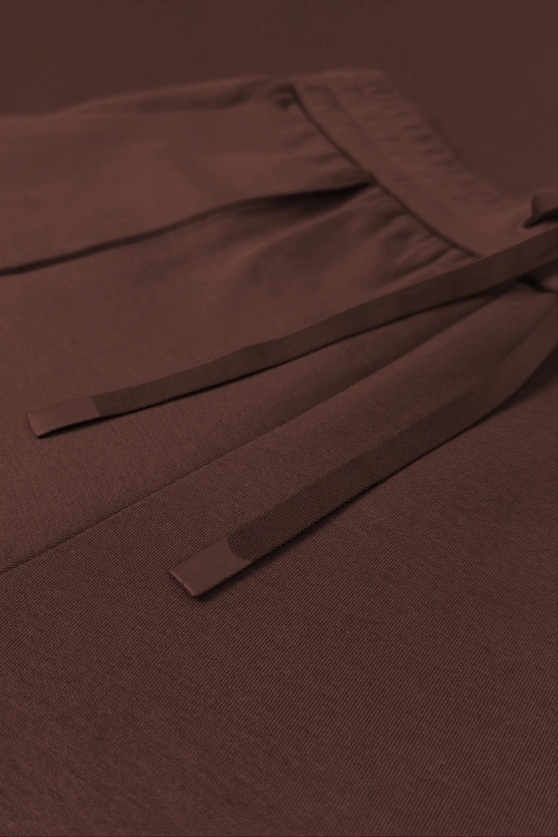 Close-up of women’s Rich Cocoa jogger pants showing the drawstring waist and matching drawcords