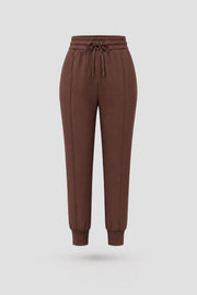 Women's Rich Cocoa drawstring jogger pants with relaxed silhouette, ribbed cuffs, and soft stretch fabric