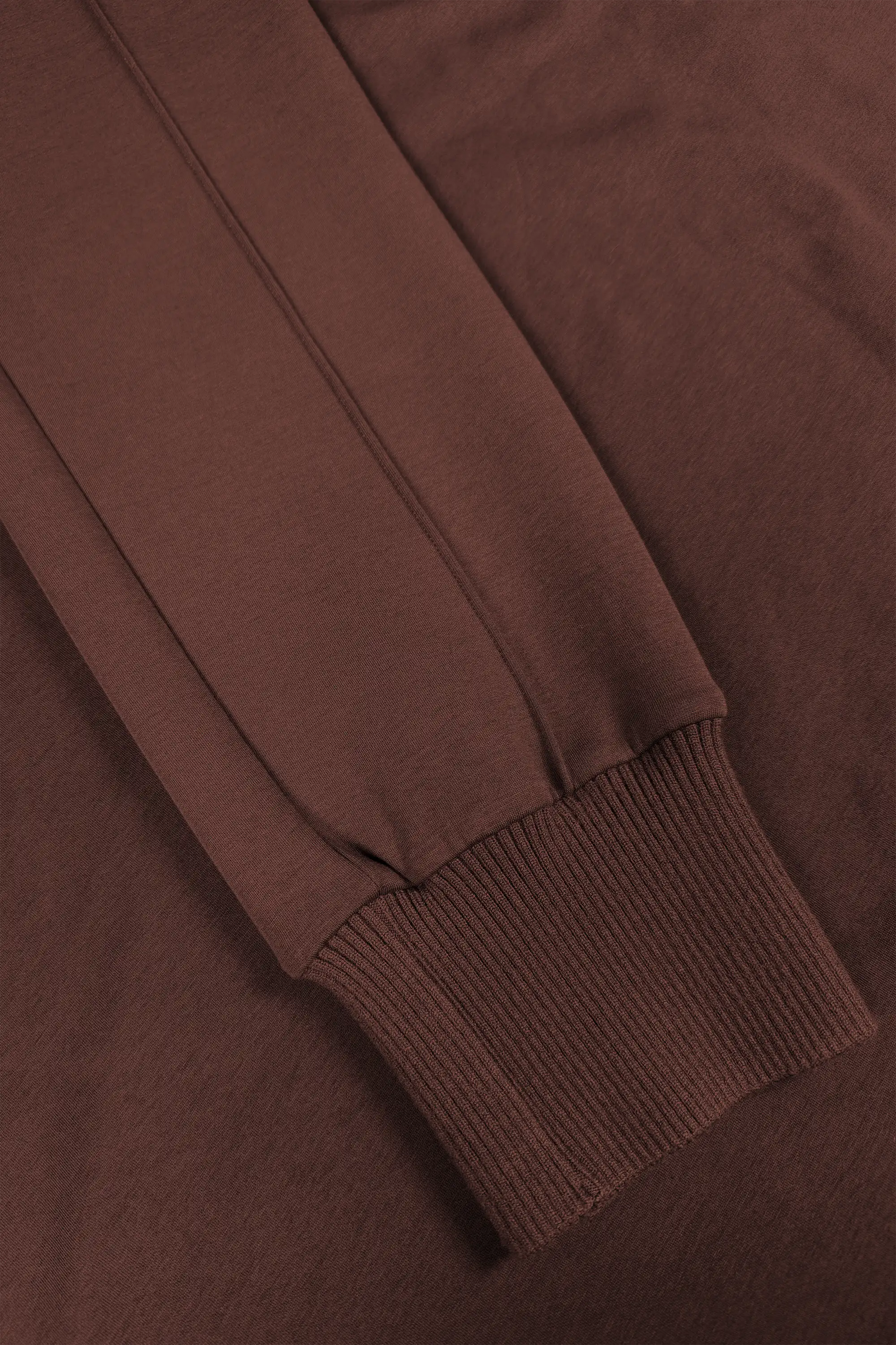 Close-up of women’s Rich Cocoa drawstring jogger pants with a ribbed ankle cuff
