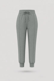 Women's Sage Grey drawstring jogger pants with relaxed silhouette, ribbed cuffs, and soft stretch fabric
