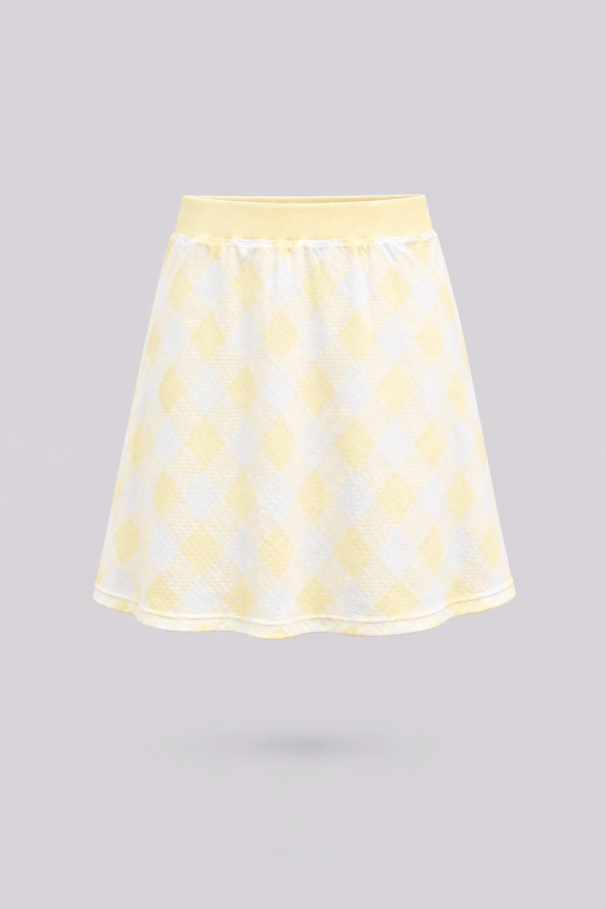 Women’s yellow gingham everyday golf skort with a high-rise waistband and A-line silhouette front view