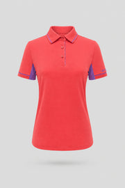 Women's coral red golf polo with tailored fit, contrast trim detailing, and breathable performance fabric