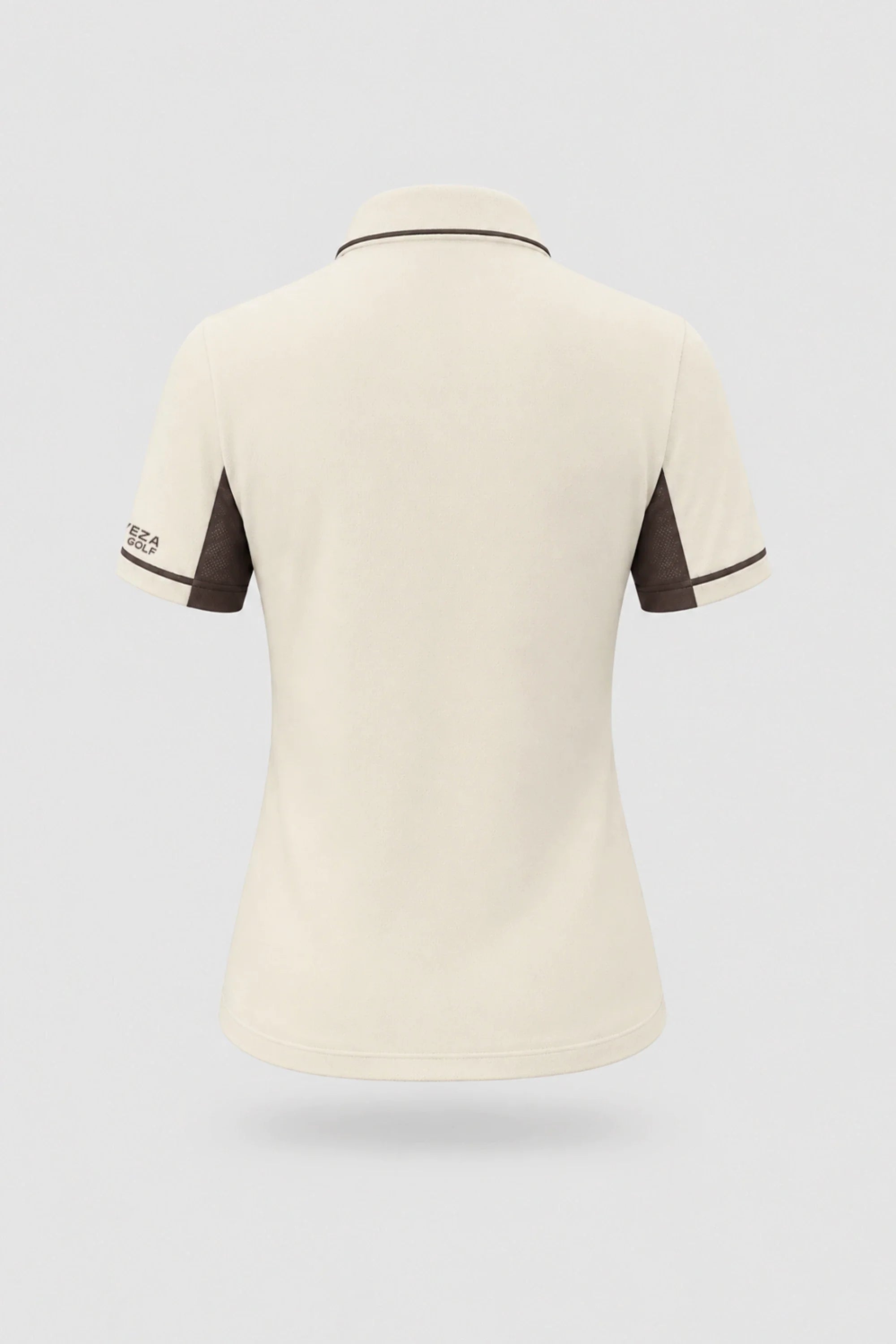 Back view of women's Cream golf polo with clean minimalist design and stretch performance fabric