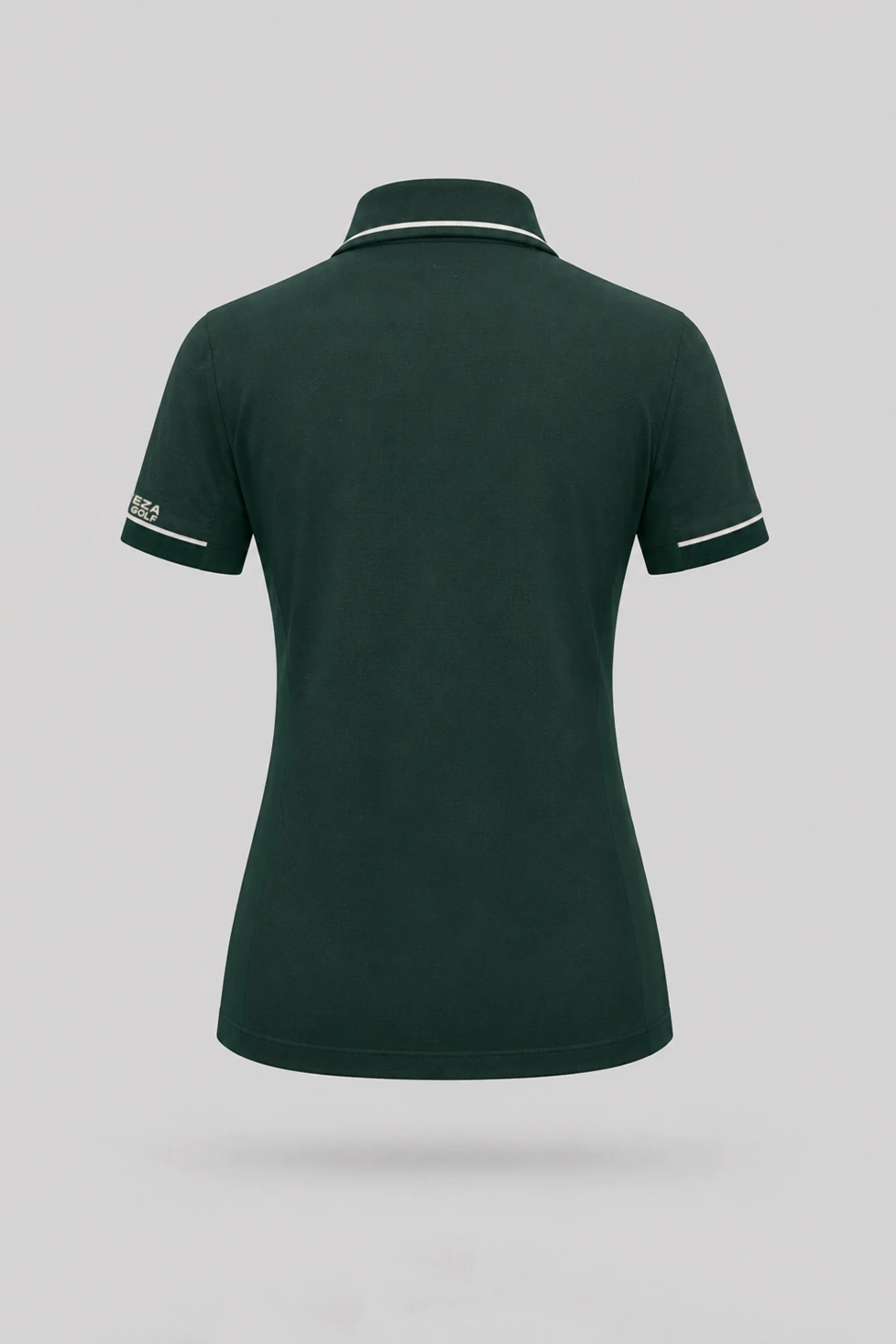 Back view of women's Evergreen golf polo with breathable mesh sleeve panels and stretch performance fabric