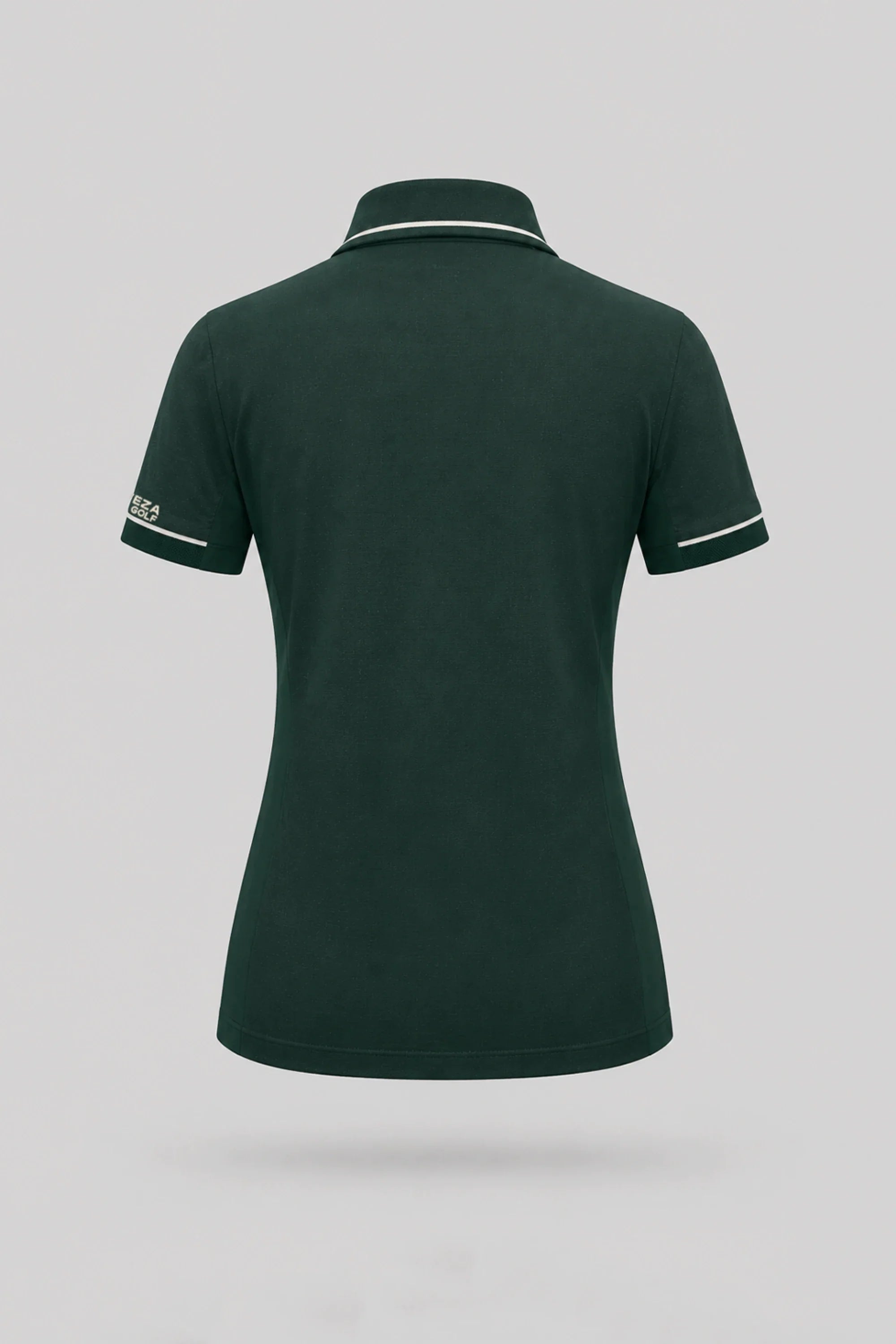 Back view of women's Evergreen golf polo with breathable mesh sleeve panels and stretch performance fabric