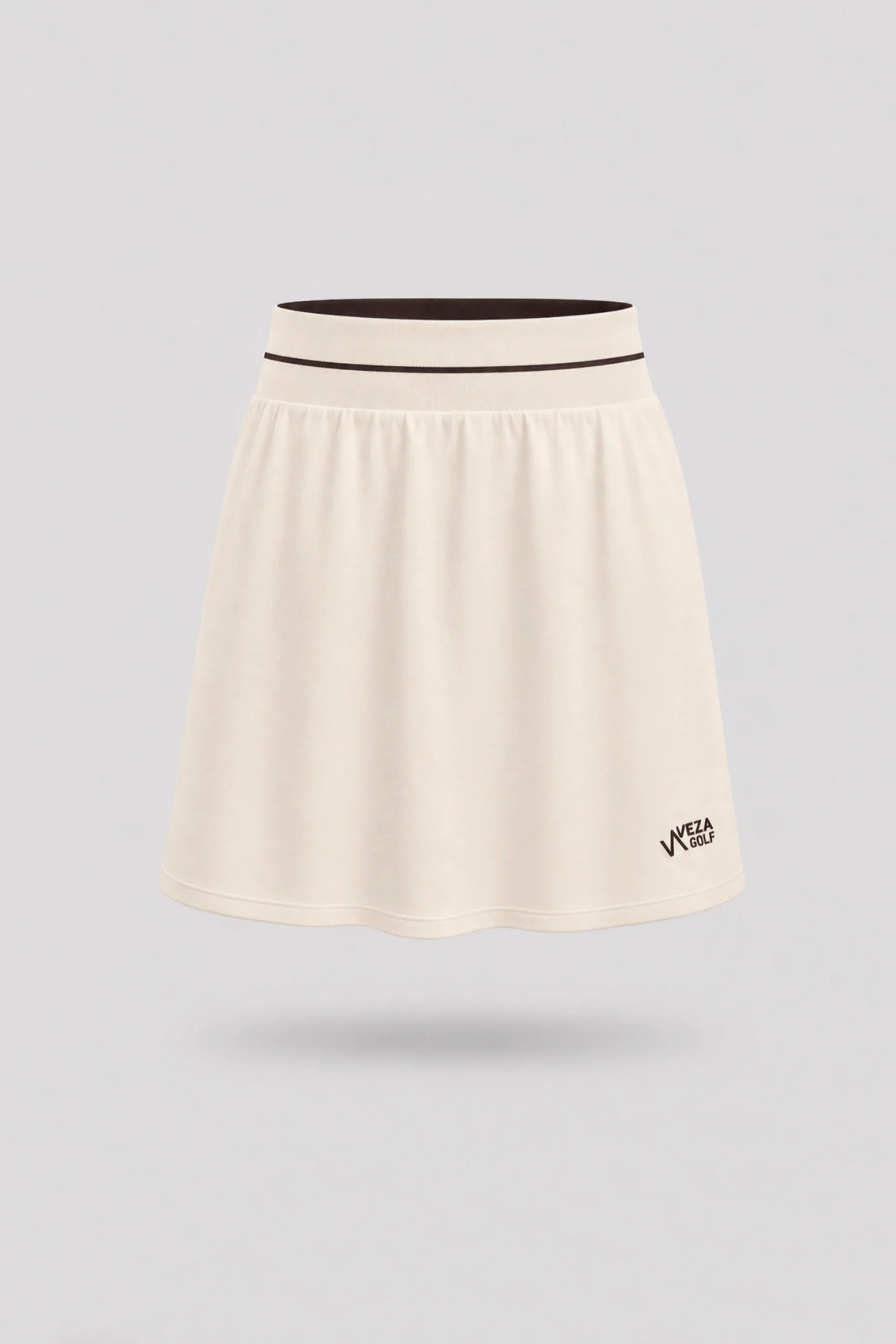 Women's Cream golf skort with A-line silhouette and comfortable wide waistband