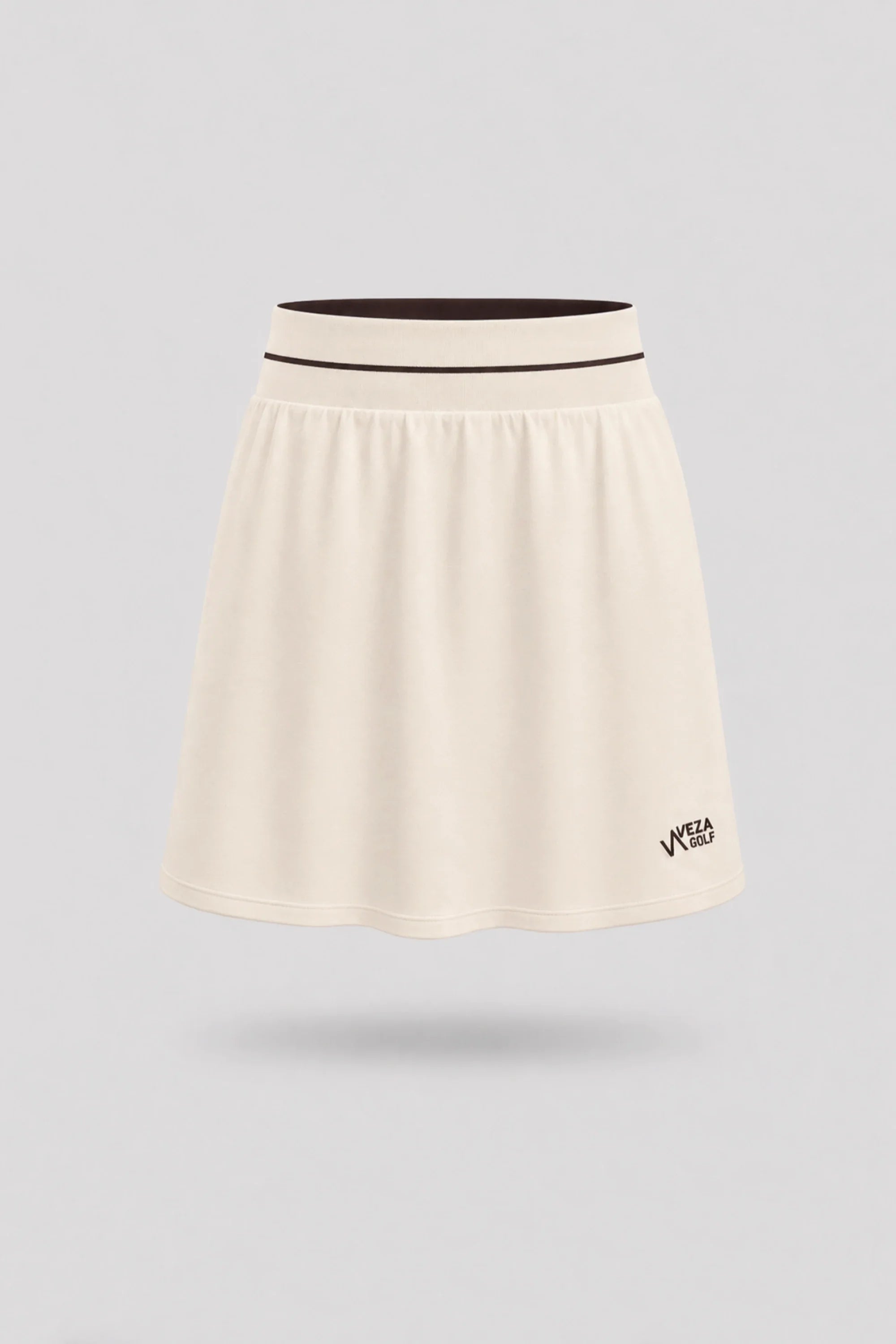 Women's Cream golf skort with A-line silhouette and comfortable wide waistband