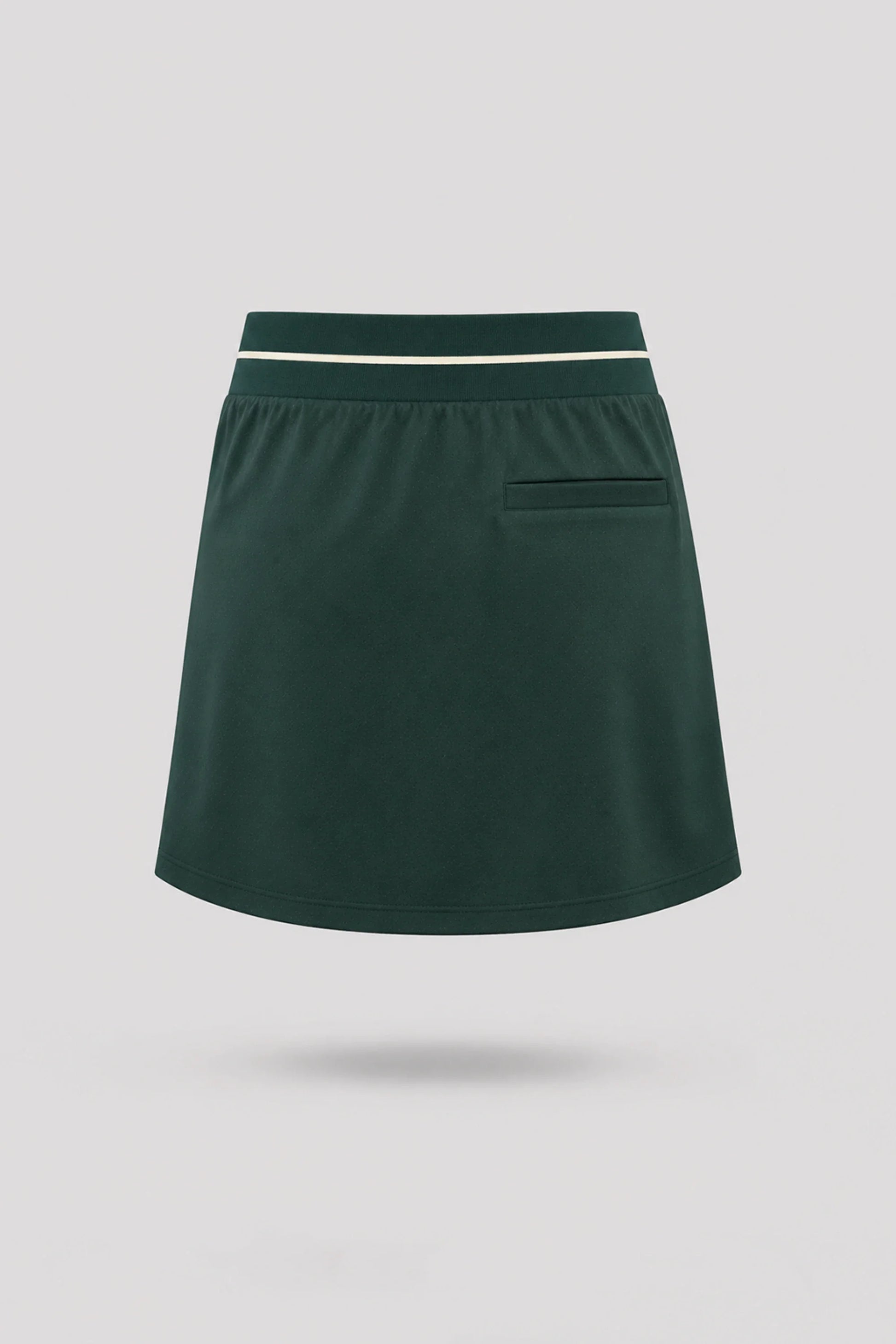 Back view of women's Evergreen golf skort with lightweight stretch performance fabric and athletic fit