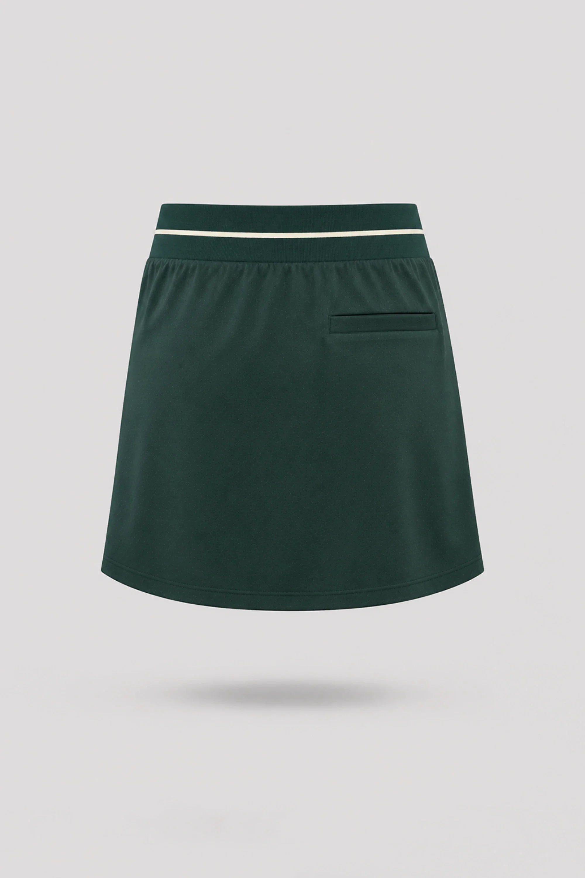Back view of women's Evergreen golf skort with lightweight stretch performance fabric and athletic fit