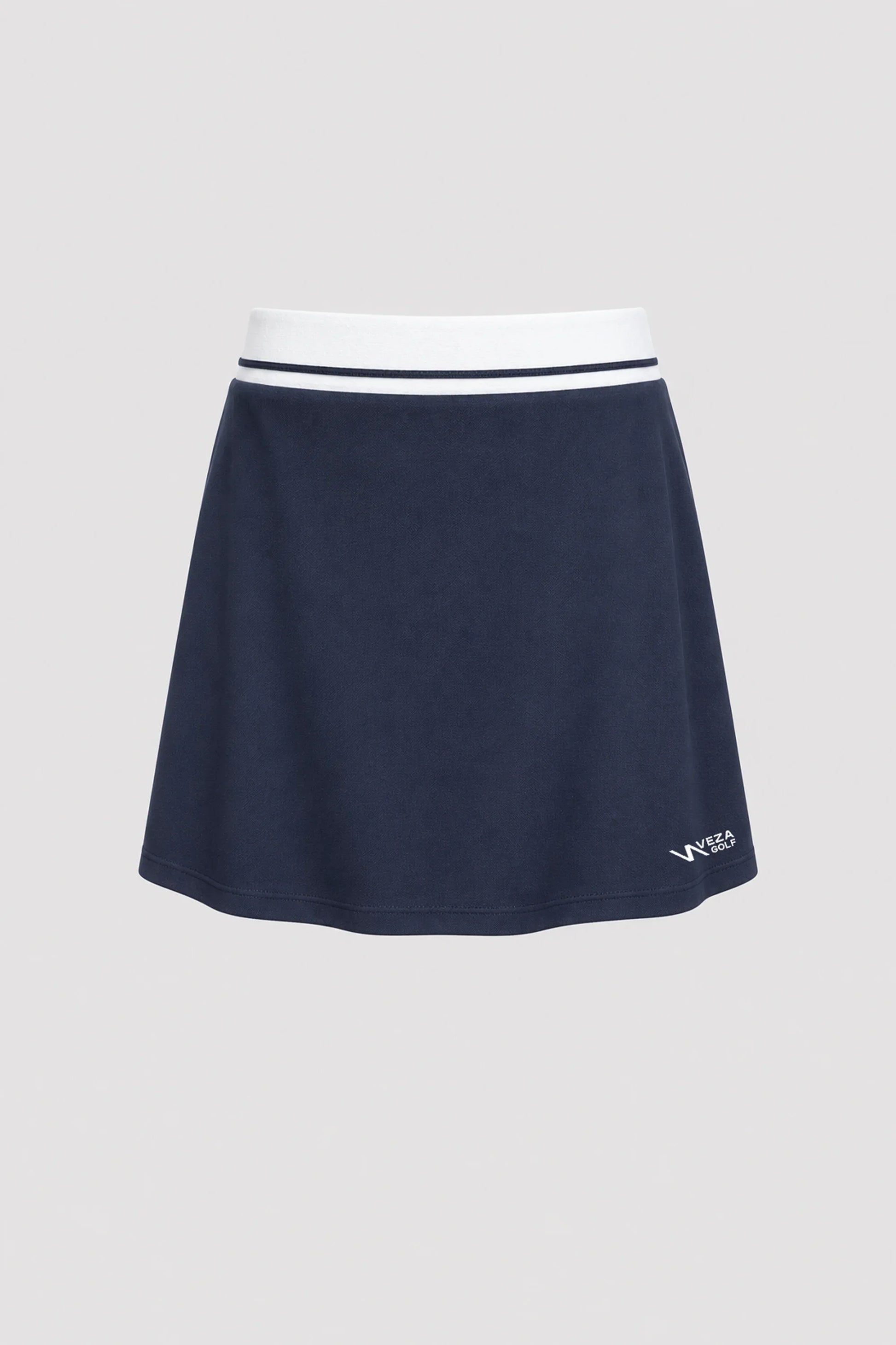Women's midnight navy golf skort with A-line silhouette and comfortable wide waistband