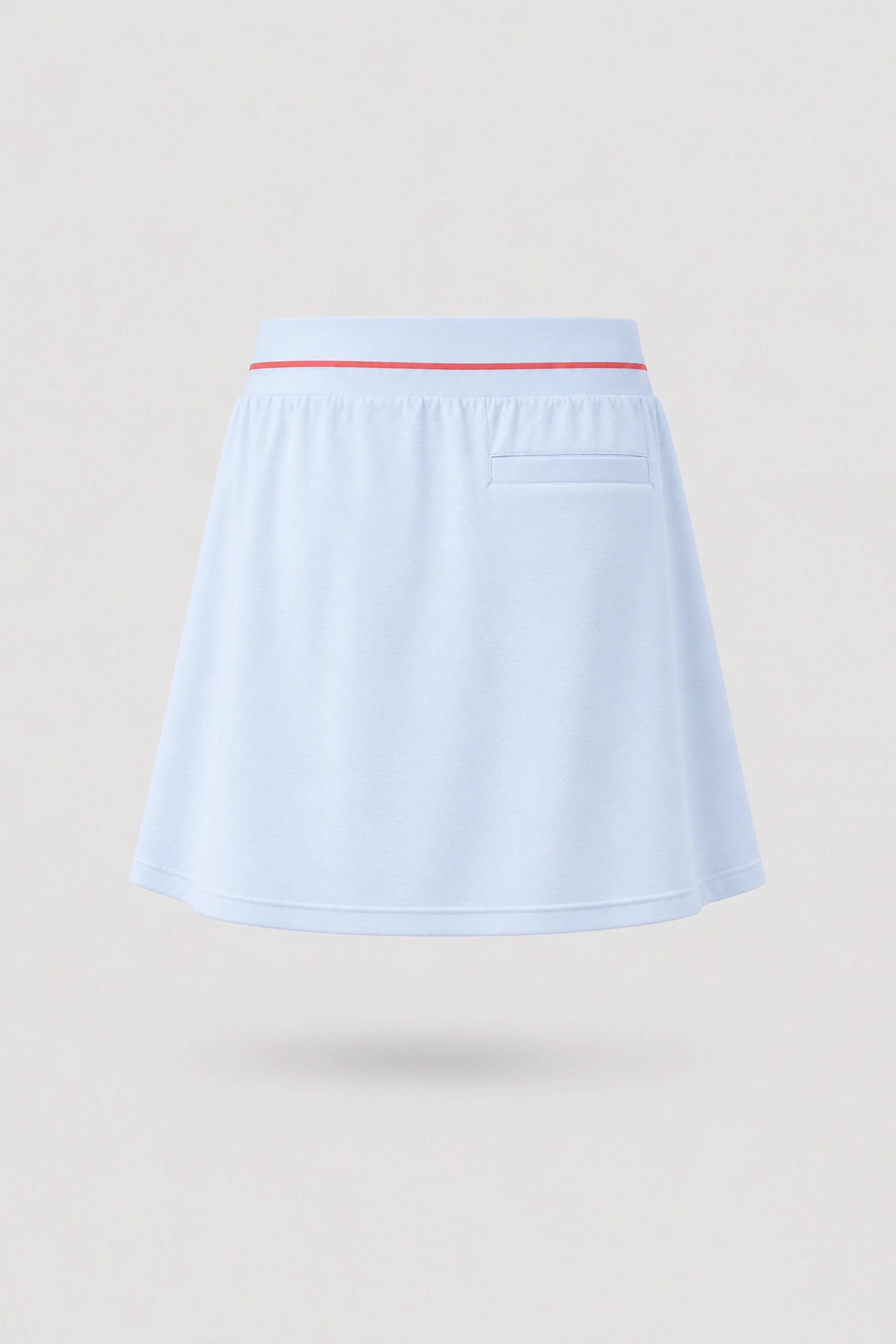 Back view of women's light blue golf skort with stretch performance fabric and flattering fit
