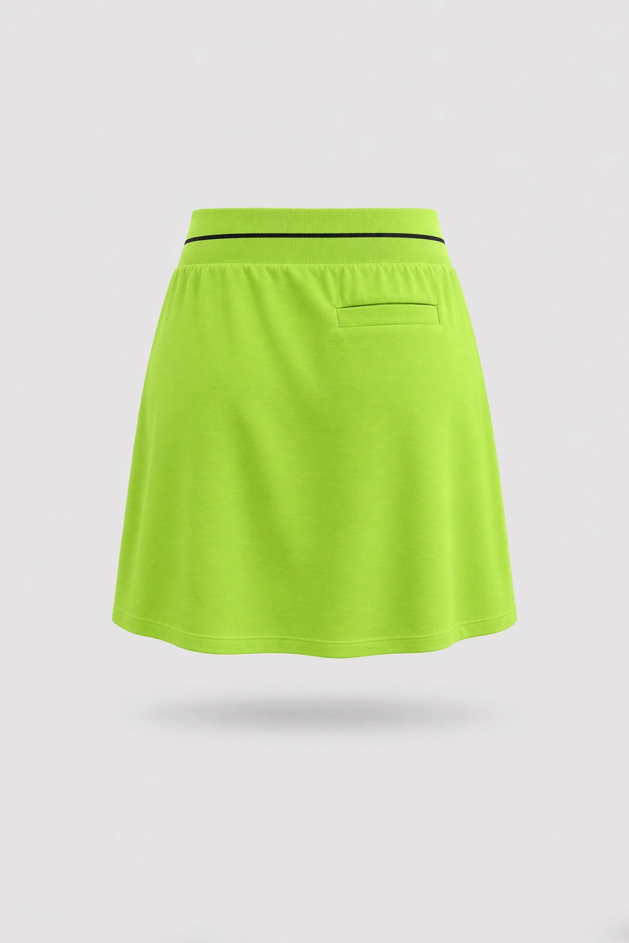 Back view of women's Volt Green golf skort with lightweight stretch performance fabric and athletic fit
