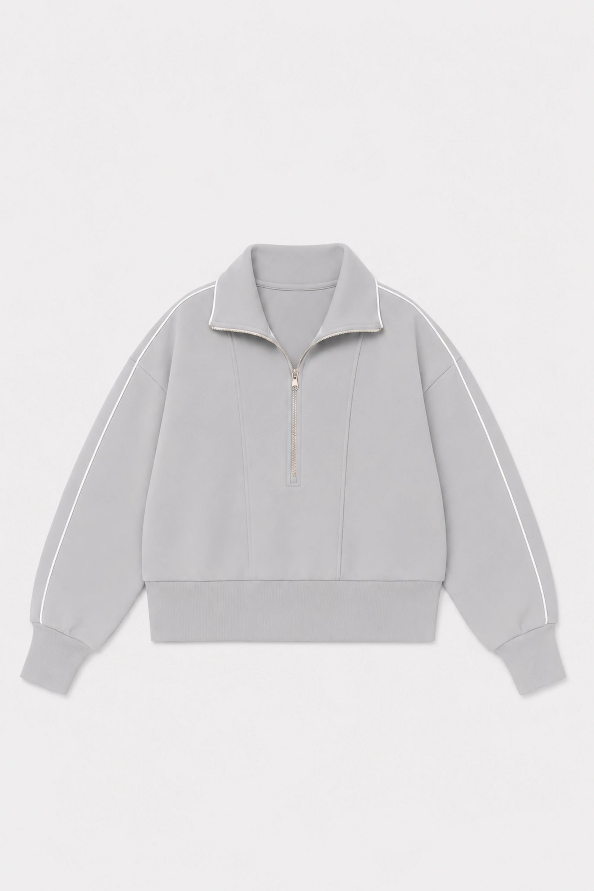 Front flat lay of Veza Golf women’s soft cloud grey half-zip golf pullover featuring contrast white piping and a zip collar