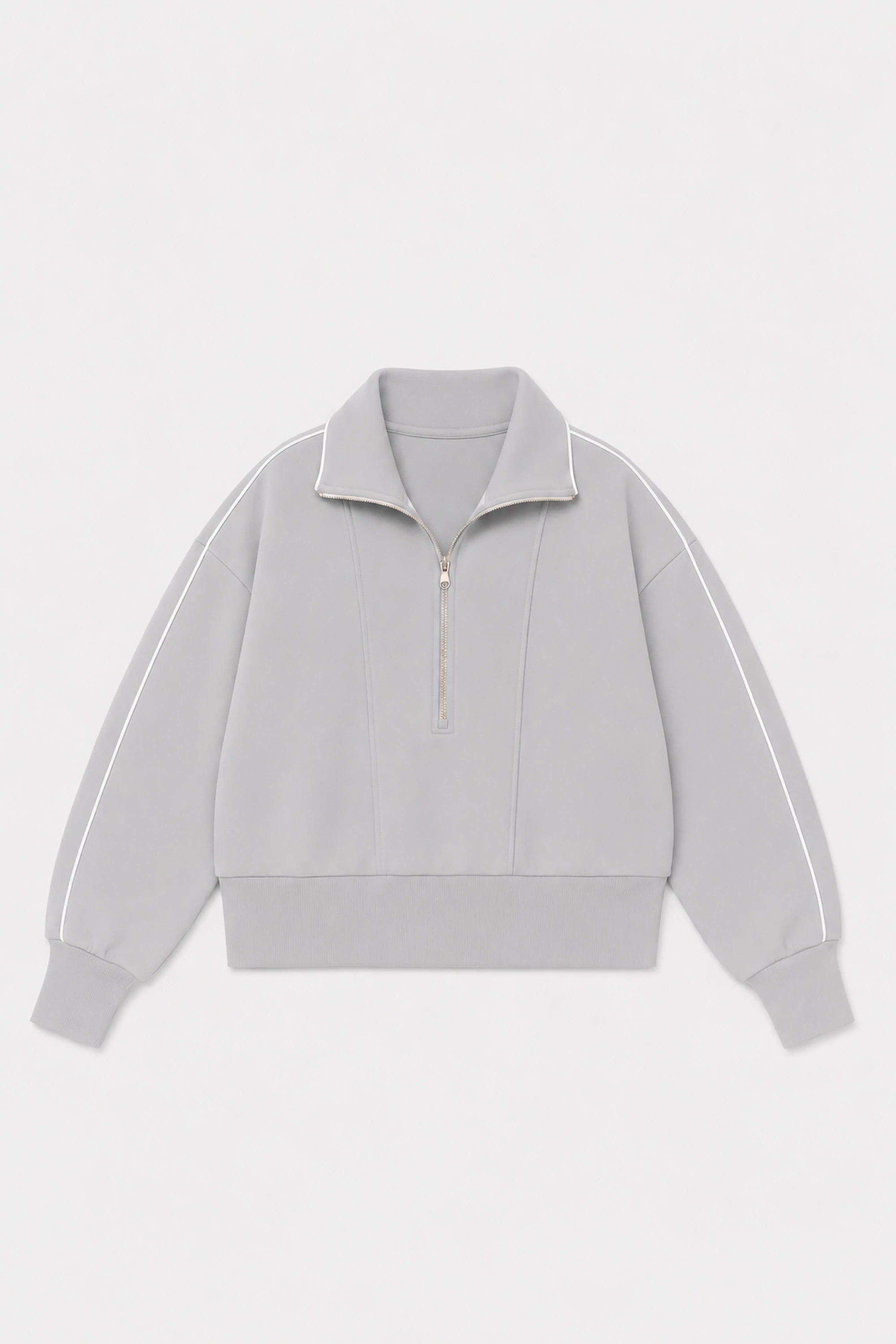Front flat lay of VEZA women’s Soft Cloud Grey half-zip golf pullover featuring contrast white piping and a zip collar