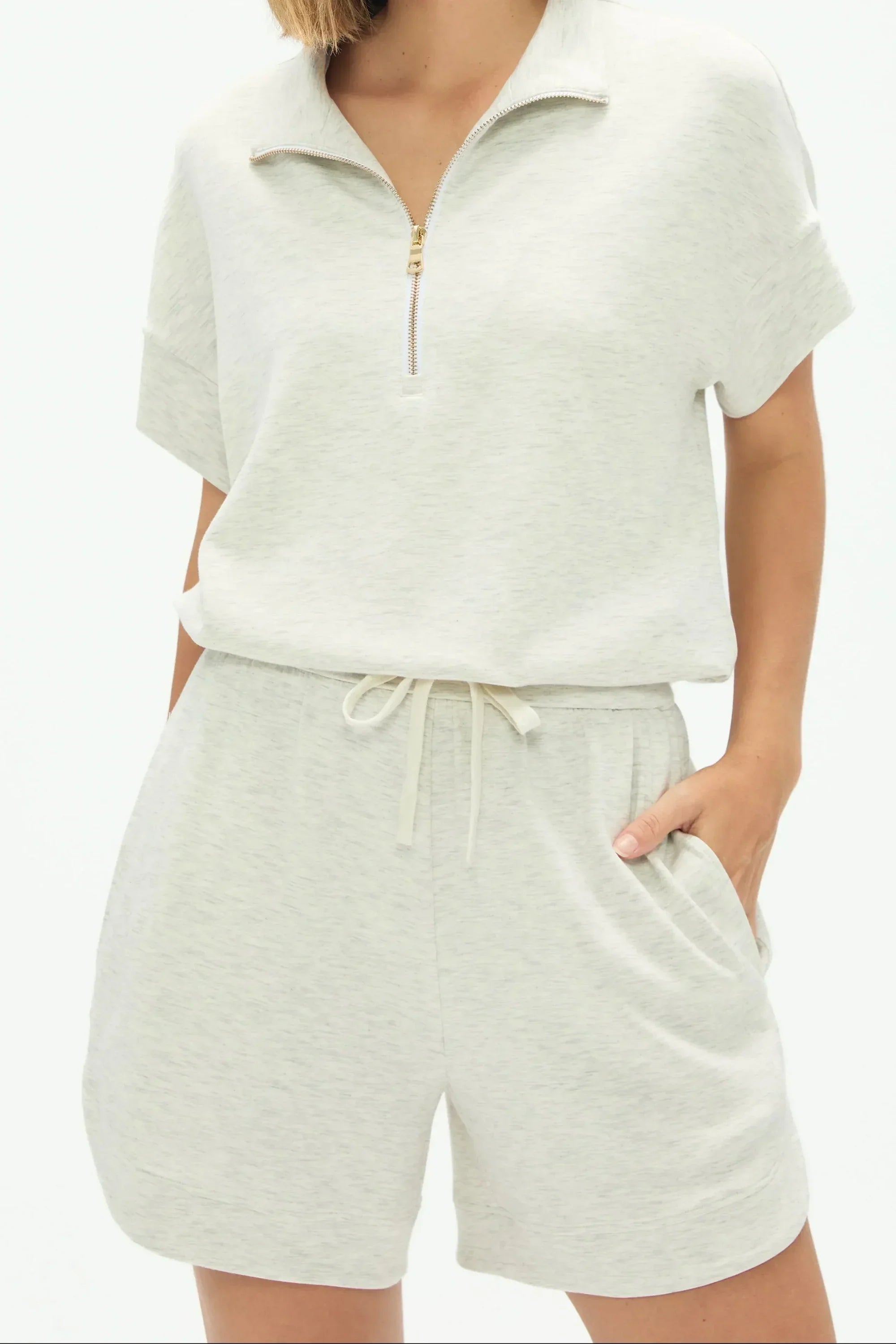 Front detail of women’s Heather Mist quarter-zip top with relaxed fit and soft drape