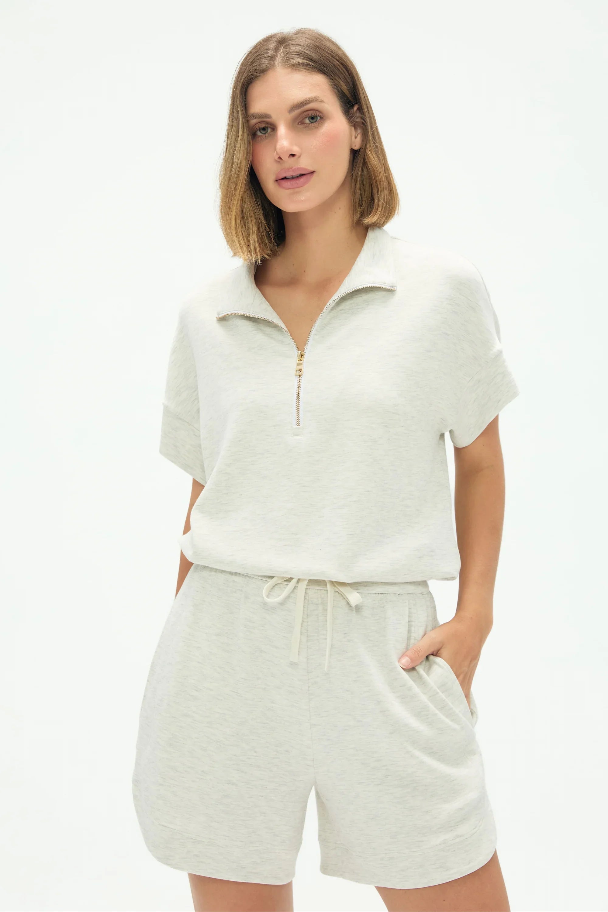 Women’s Heather Mist quarter-zip top styled for everyday comfort and movement